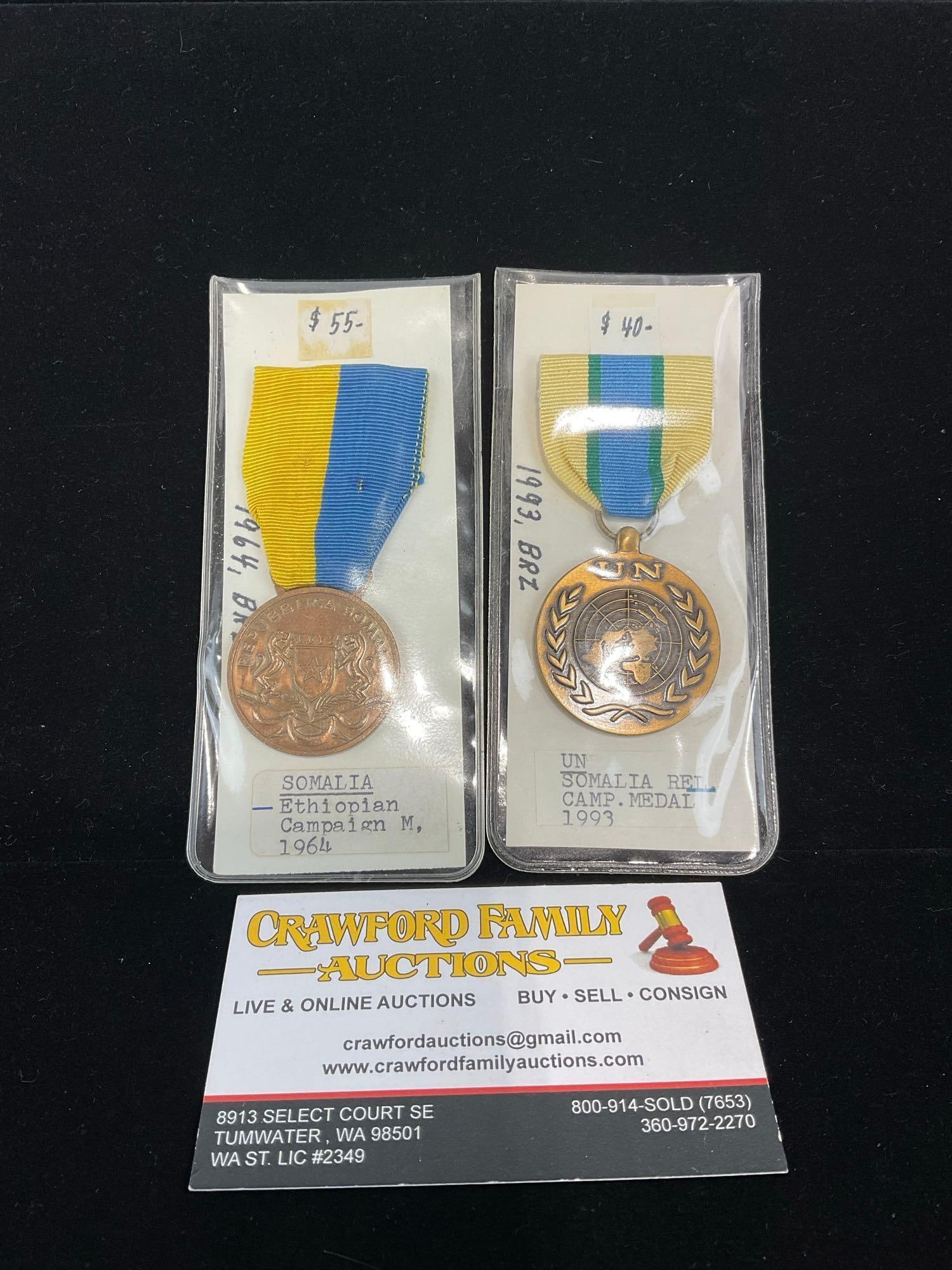 Pair of Medals, Somali Ethiopian Campaign 1964 & United Nations Somali Relief Campaign 1993: All from a single collection, these are briefly described on the tag and were kept in a display. They measure approx 6h x 3w x 2d inches. See pics. E-5300 