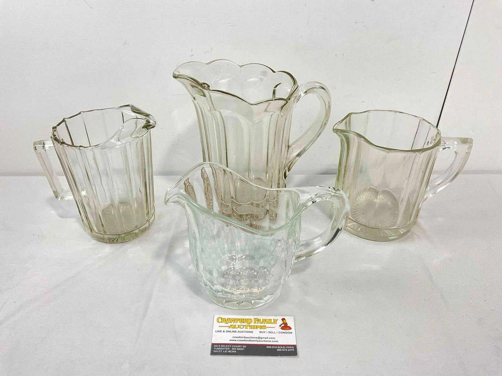4 pcs Vintage Clear Glass Water Pitchers. Very Good Condition. Measures 8" x 5" x 8" see pics. (1 of 9)
