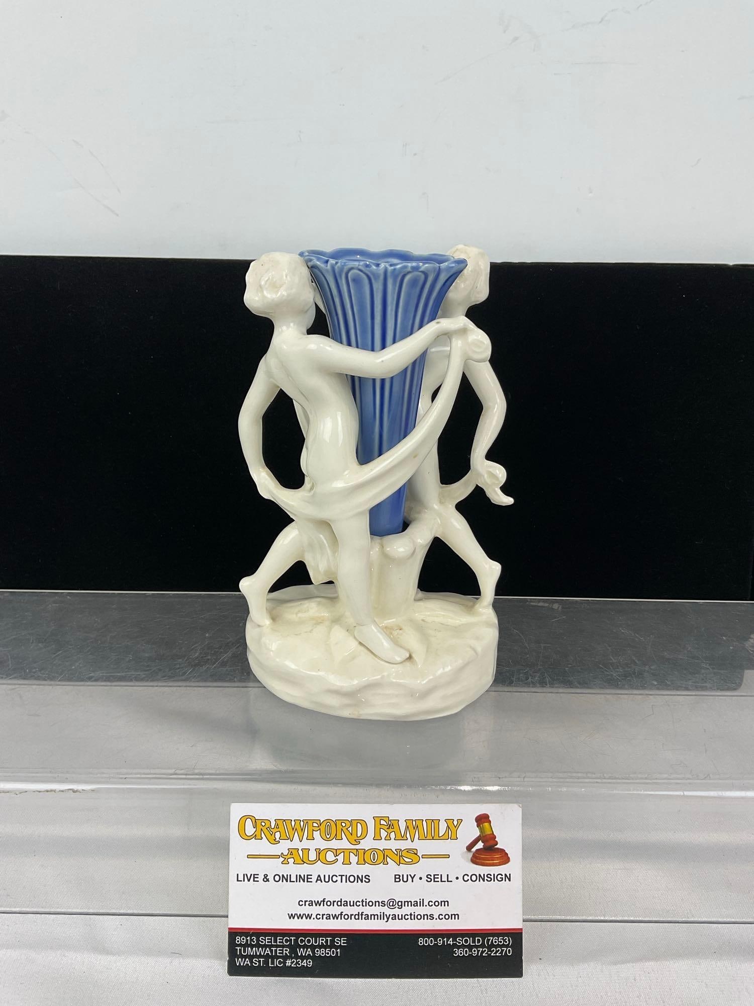 Antique 1920s Art Deco Porcelain Dancing Nymph/ scarf dancers Bud Vase, White w/ Blue Vase.: Possibly German Marked 289, there is a seal on the bottom, but it is illegible. Appears to be in good shape. The piece measures approx 7h x 5w x 4d inches. See pics. E-5630