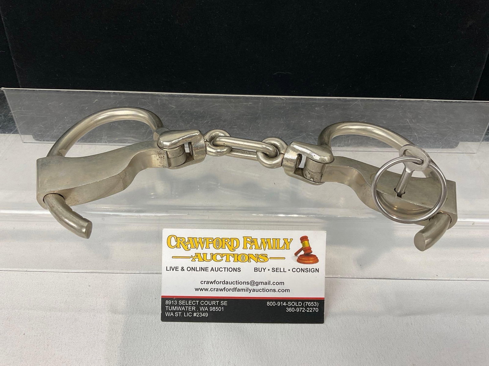 Early 20th Century Towers Double Lock Handcuffs, w/ Key, 6h x 5w x 3d inches: Appears to be in good shape. The piece measures approx 6h x 5w x 3d inches. See pics. E-5360 