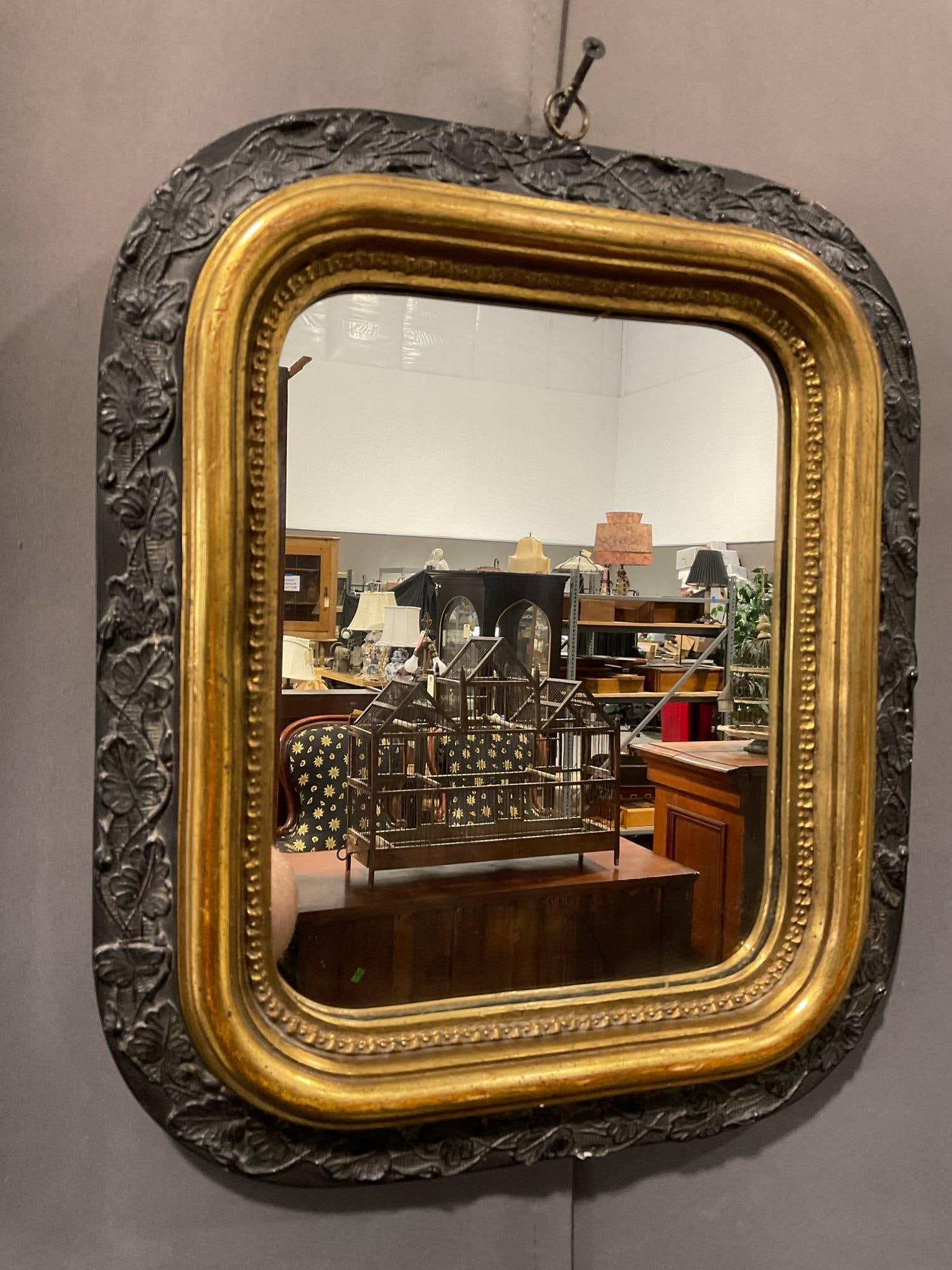 Antique Borghese Mirror, Gilt Frame, Black Foliate Carved Rim, 14h x 12w x 3d inches: Appears to be in fair to good shape. The piece measures approx 14h x 12w x 3d inches. See pics. E-5580 