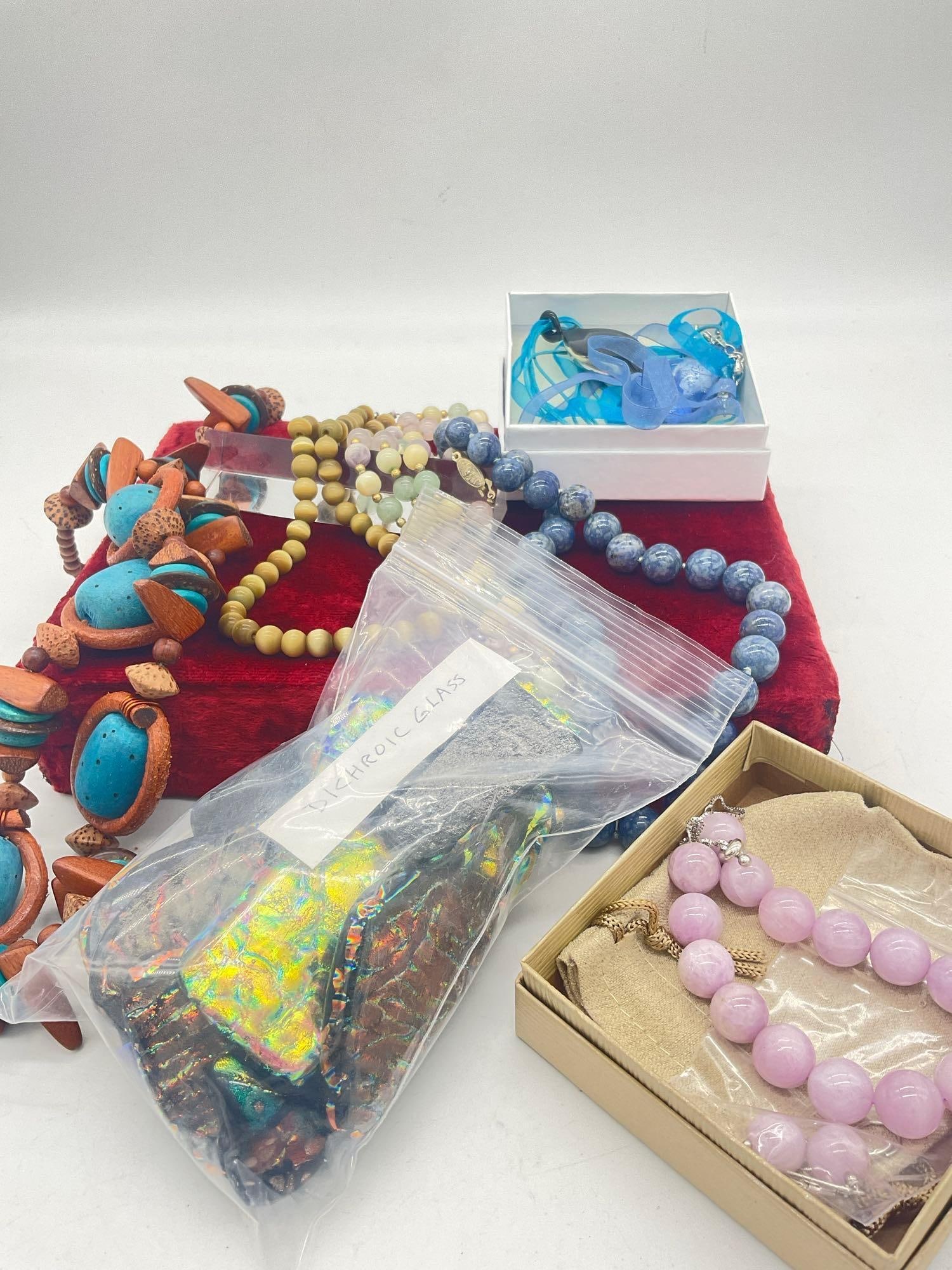 Nice collection of Assorted necklaces ,Jade Denim Lapis , Glass & wood + Dichroic Glass: C-5010 28" Multi colored bead necklace w/ gold toned beads 15" Green Beaded necklace 18' Blue Denim Lapis Necklace From J Tv Fine jewelry Light Purple Jade Adjustable Bracelet w/ Sterling si