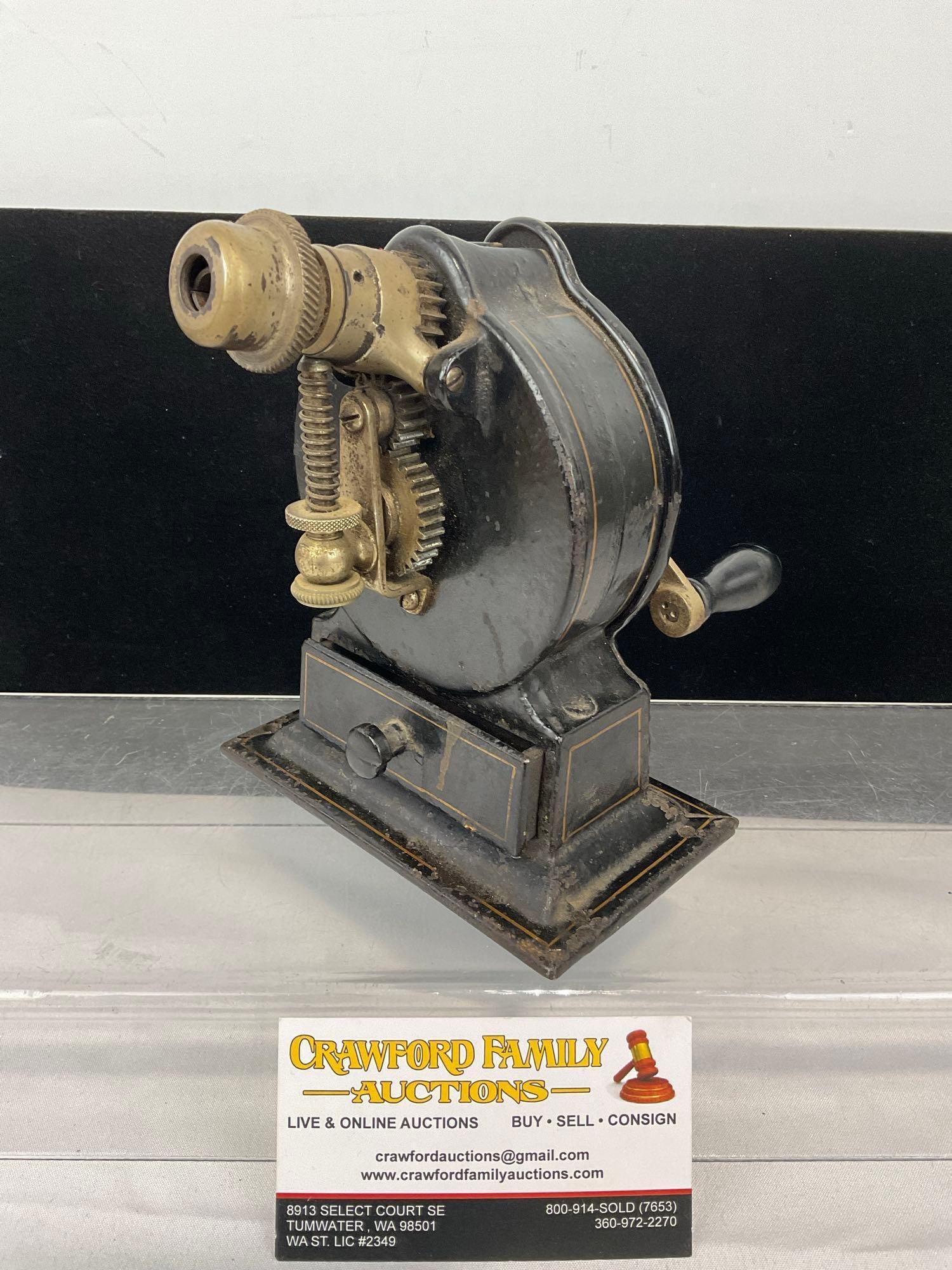 Early 20th Century Cast Iron Lakeside Pencil Sharpener, Eberhard Faber, Painted Black, 7h x 6w x 6d: Appears to be in good shape, some missing finish, the piece seems to operate nicely. The piece measures approx 7h x 6w x 6d inches. See pics. E-5360 