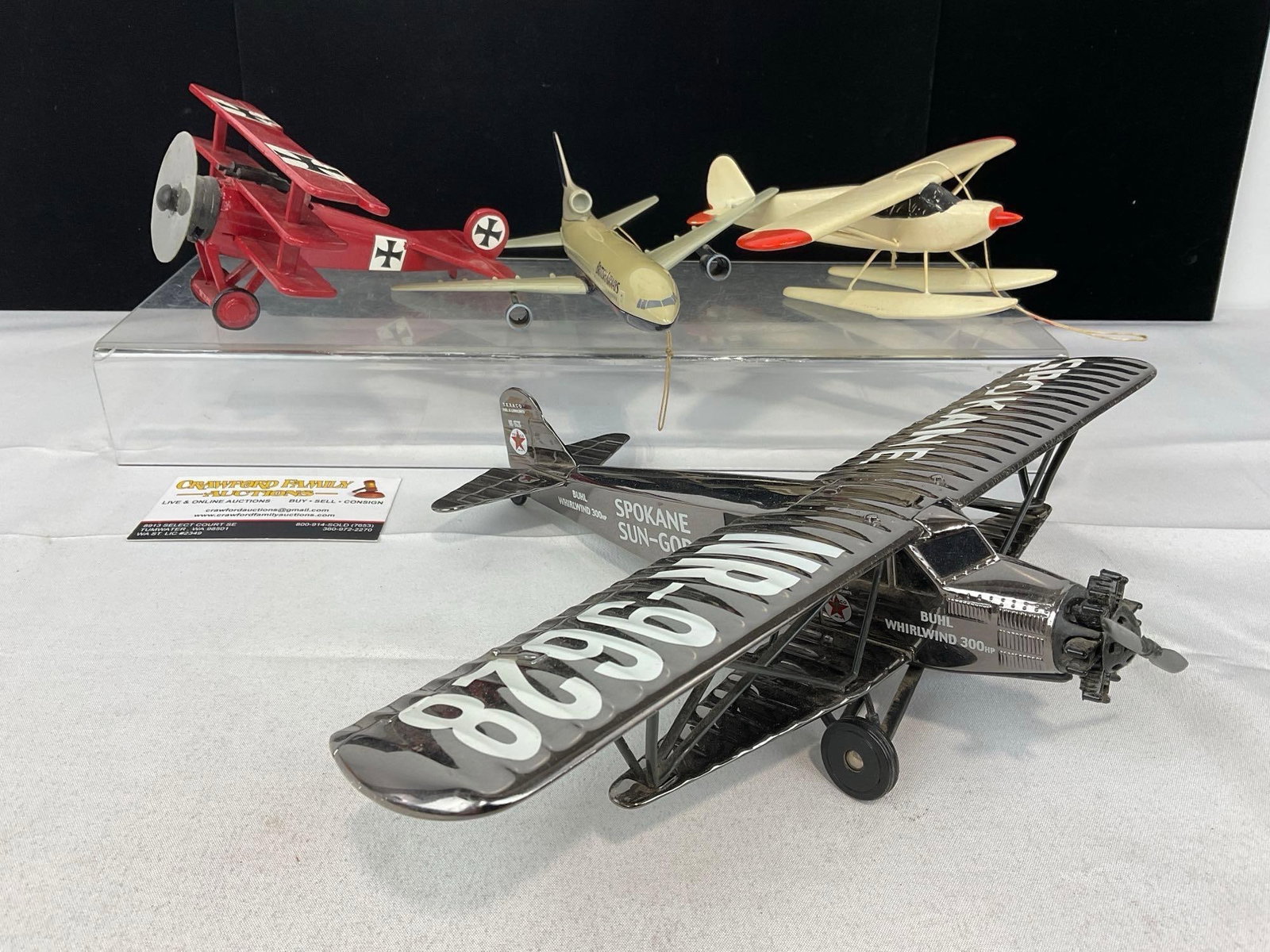 4 Plane Figures, Texaco Spokane Sun-God Prop Plane, British Airways Jet, Seaplane & Red Baron PLane: Appears to be in good shape. The piece measures approx 11h x 11w x 6d inches. See pics. E-5360 