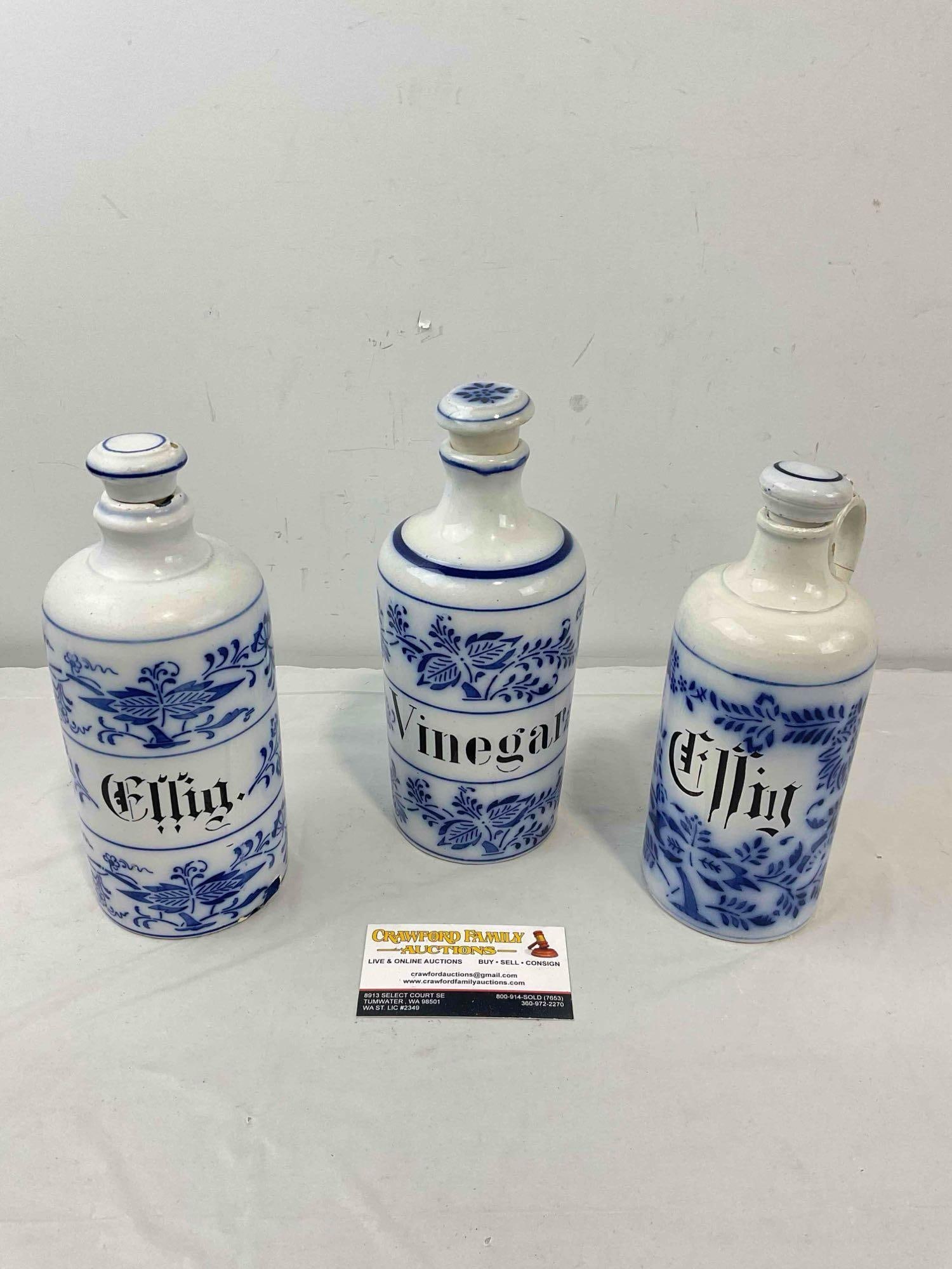 3 pcs Vintage? Flow Blue Ceramic Condiment Bottles "Vinegar" & "Ellig." Very Good Condition.: 3 pcs Vintage? Flow Blue Ceramic Condiment Bottles "Vinegar" & "Ellig." Very Good Condition. Minor wear indicative of age and use, one has a repaired handle, condition is otherwise very good.