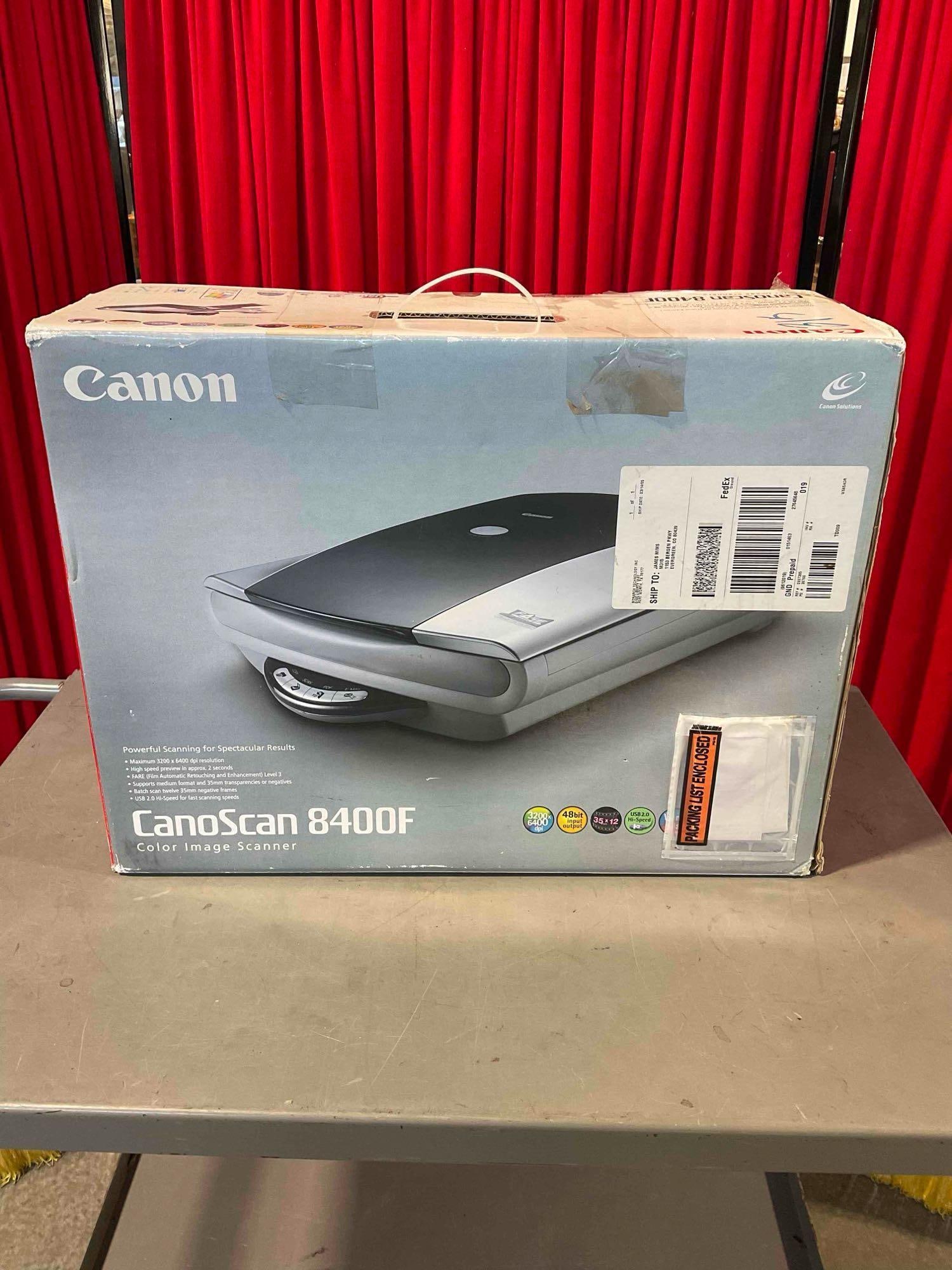 Canon CanoScan 8400F Color Image Scanner w/ Original Package Material and Box: Approximately 25" x 9" x 19" in original box. Item is if fair condition. There is a bit of UV yellowing on the back of the case. But beyond that no visible wear. V-5180 *Oversized shipping may ap