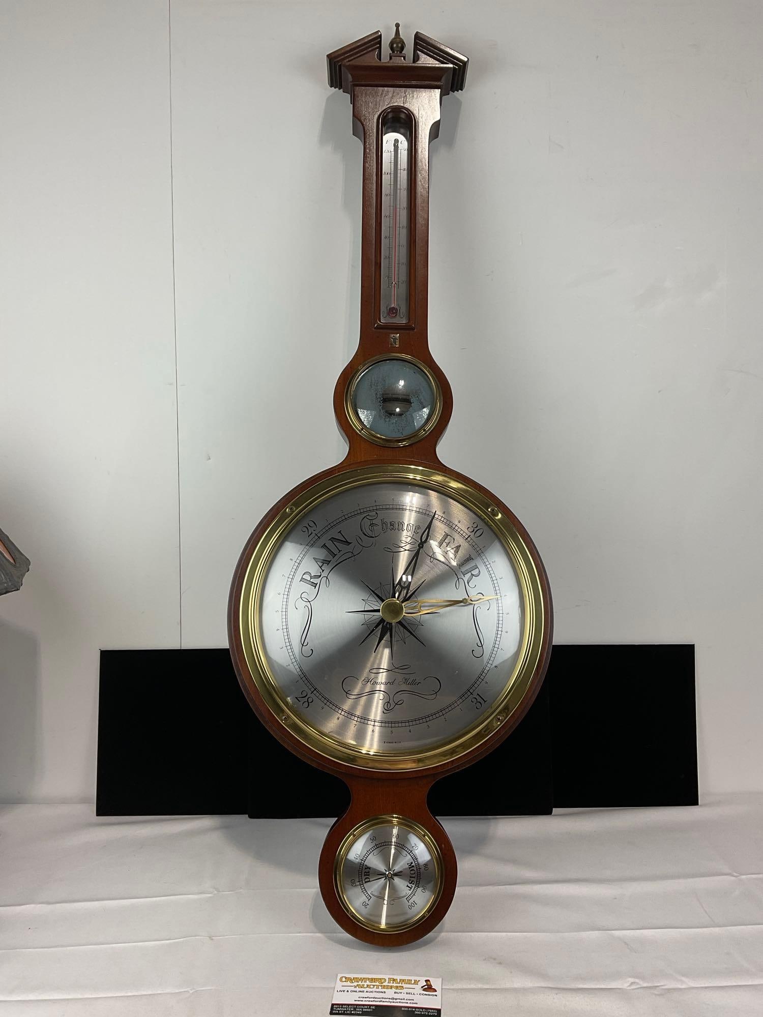 Howard Miller Banjo Weather Station Olympia 612-721, Thermometer & Barometer, 38h x 13w x 3d inches: Appears to be in good shape. The piece measures approx 38h x 13w x 3d inches. See pics. E-5520 *Oversized shipping may apply* 