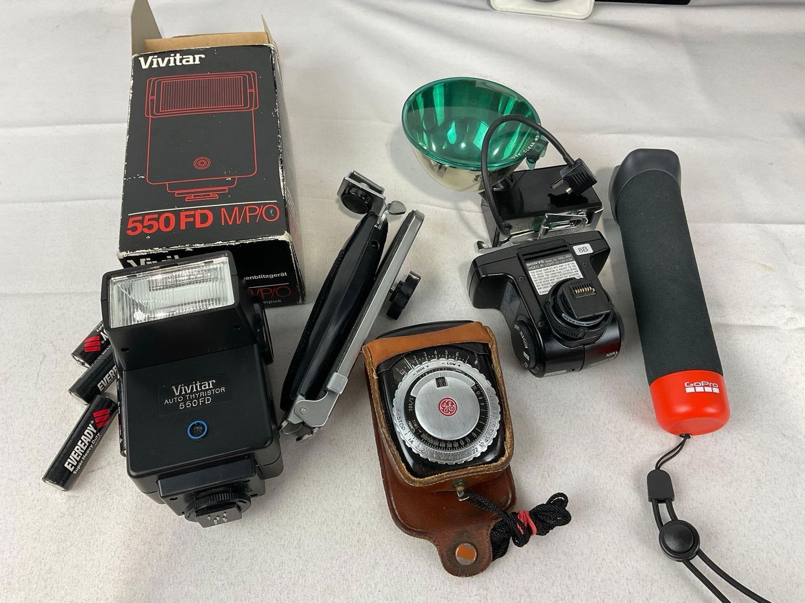 Asst Camera Accessories, Vivitar Flash Module & more, couple Grips, Filters - 4