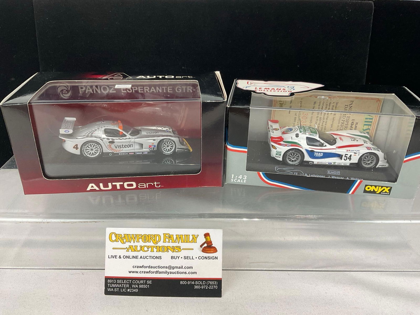 2 1/43 Scale Diecast Cars, 1997 Panoz GTR-1 LM & 98 Panoz Esperante GTR-1 LM24H, Andy Wallace: Appears to be in good shape. The piece measures approx 7h x 7w x 4d inches. See pics. E-5420