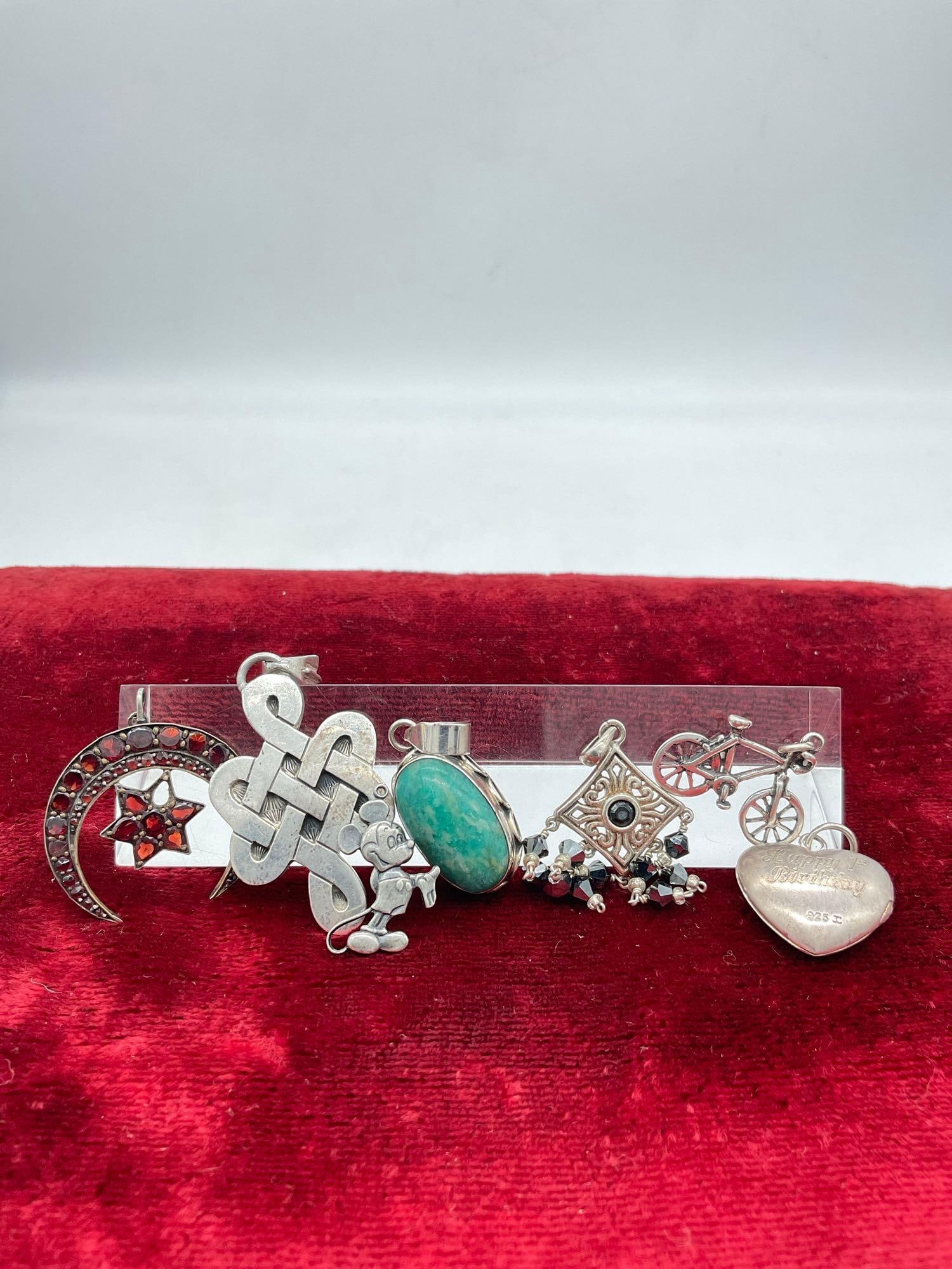 Collection of 7 sterling silver pendants in various styles: Jc-1554 