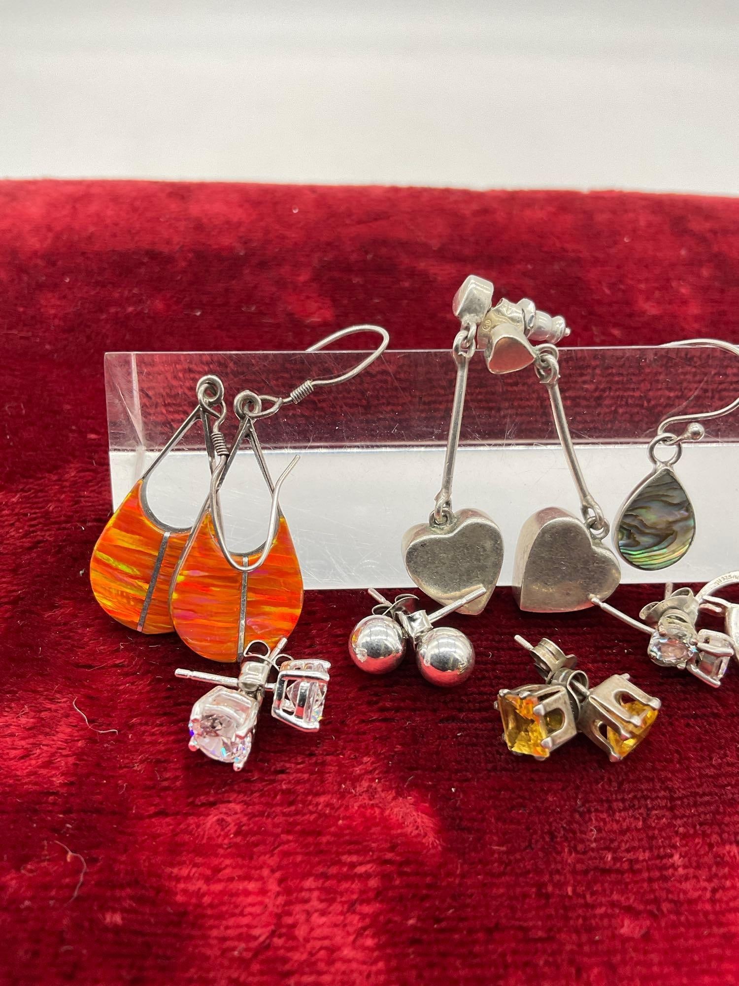 10 pairs of sterling silver earrings - many with colored glass and semi precious stones - 2