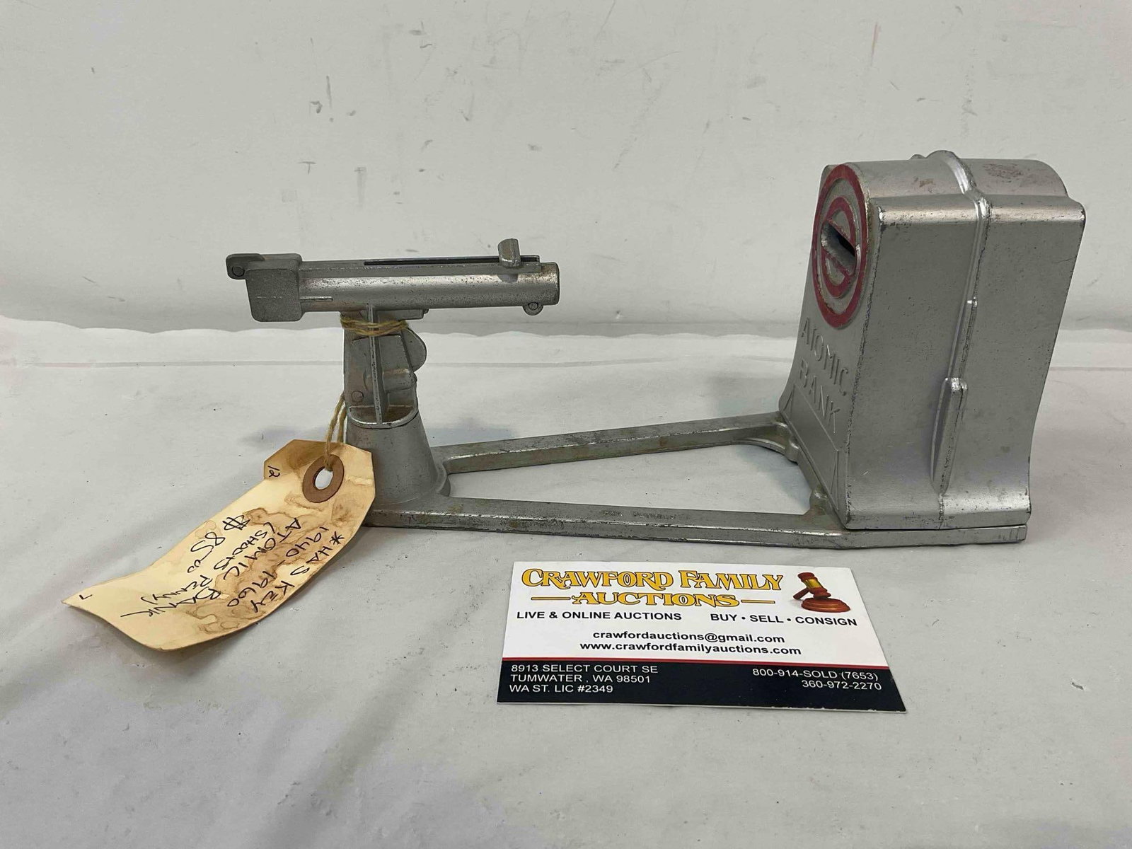 Vintage Duro Pattern-Mold Co. Atomic Mechanical Coin Bank w/ Key. Very Good Condition.: Vintage Duro Pattern-Mold Co. Atomic Mechanical Coin Bank w/ Key. Very Good Condition. Minor wear indicative of age and use, condition is otherwise very good. Last valued at $85. Measures 9" x 3" x