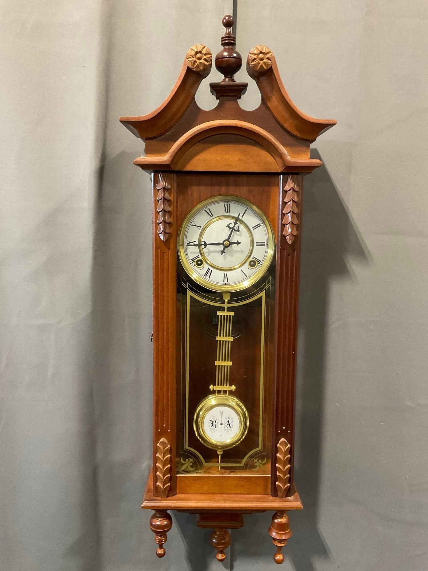 Early 20th Century Elgin Clock Co 31 Day Tall Wall Clock Time Strike, 30h x 10w x 7d inches: All from the same collection. Appears to be in fair to good shape. The piece measures approx 30h x 10w x 7d inches. See pics. E-5580 *Oversized shipping may apply* 