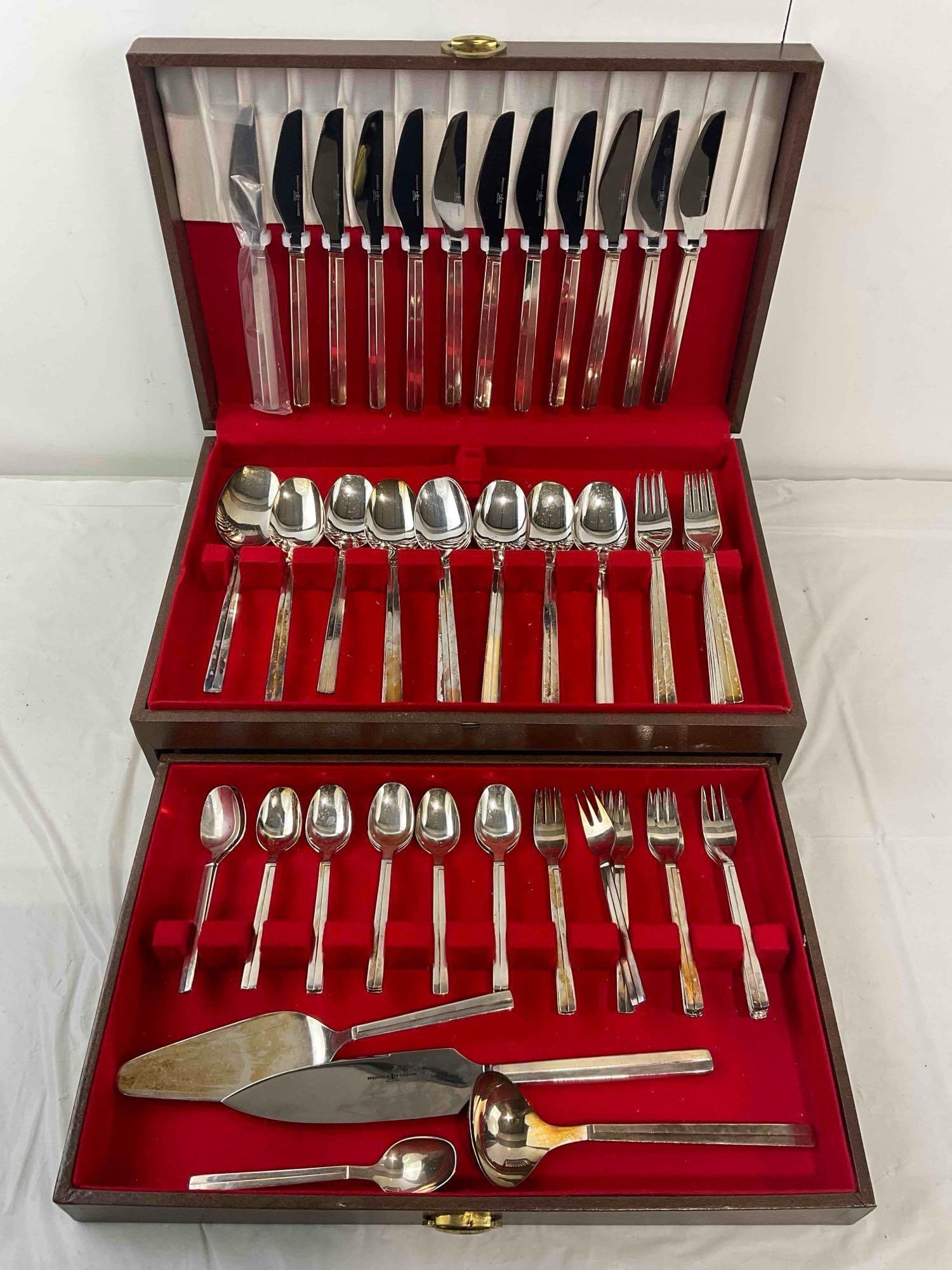 58 pcs Vintage Pfeiffer Solingen Stainless Steel Silverware in Vinyl Case. Excellent Condition.: 58 pcs Vintage Pfeiffer Solingen Stainless Steel Silverware in Vinyl Case. Excellent Condition. Minor discoloration indicative of age and use, condition is otherwise very good. Measures 17" x 11" x 5"