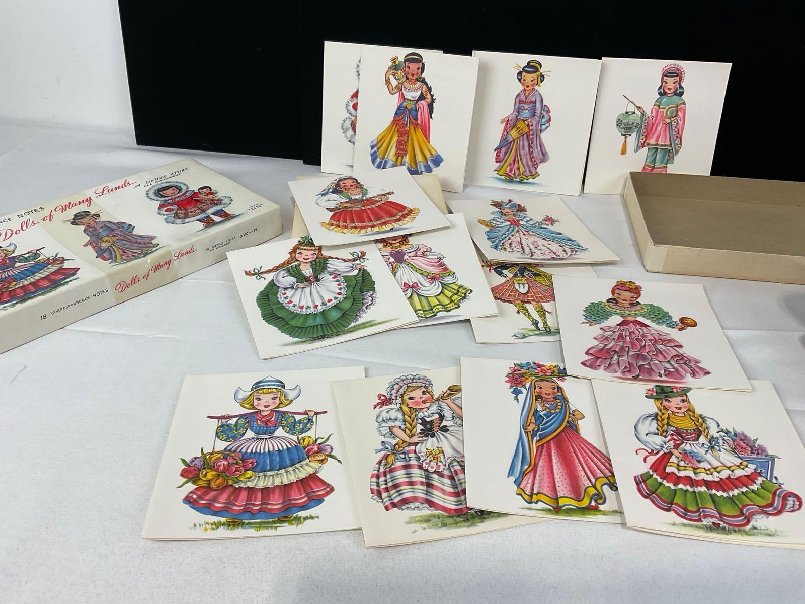 Asst of Doll related Collectibles, Shoe & Teapot Figures, Asst Clothes, Planters, Combs, Patterns - 5