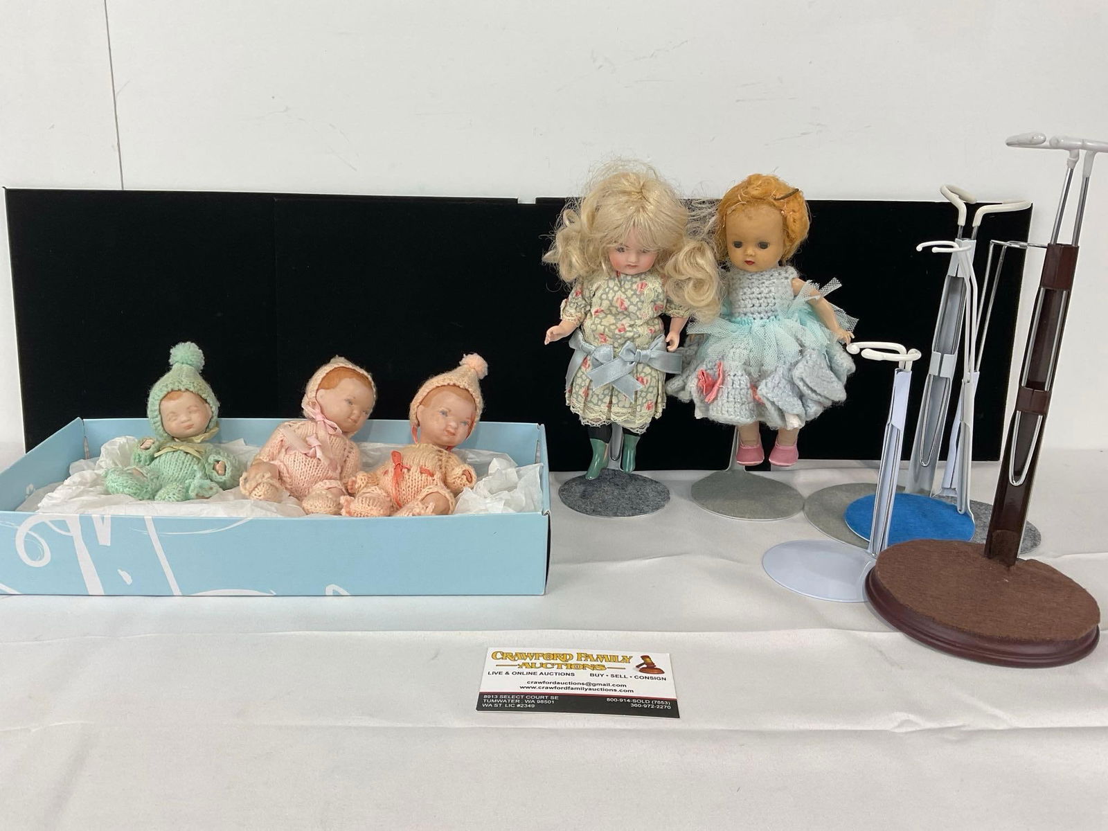 Trio of Baby Figures w/knit clothes, Pair of Dolls, w/ 5 stands: Appears to be in good shape. The piece measures approx 6h x 13w x 7d inches. See pics. E-5430 