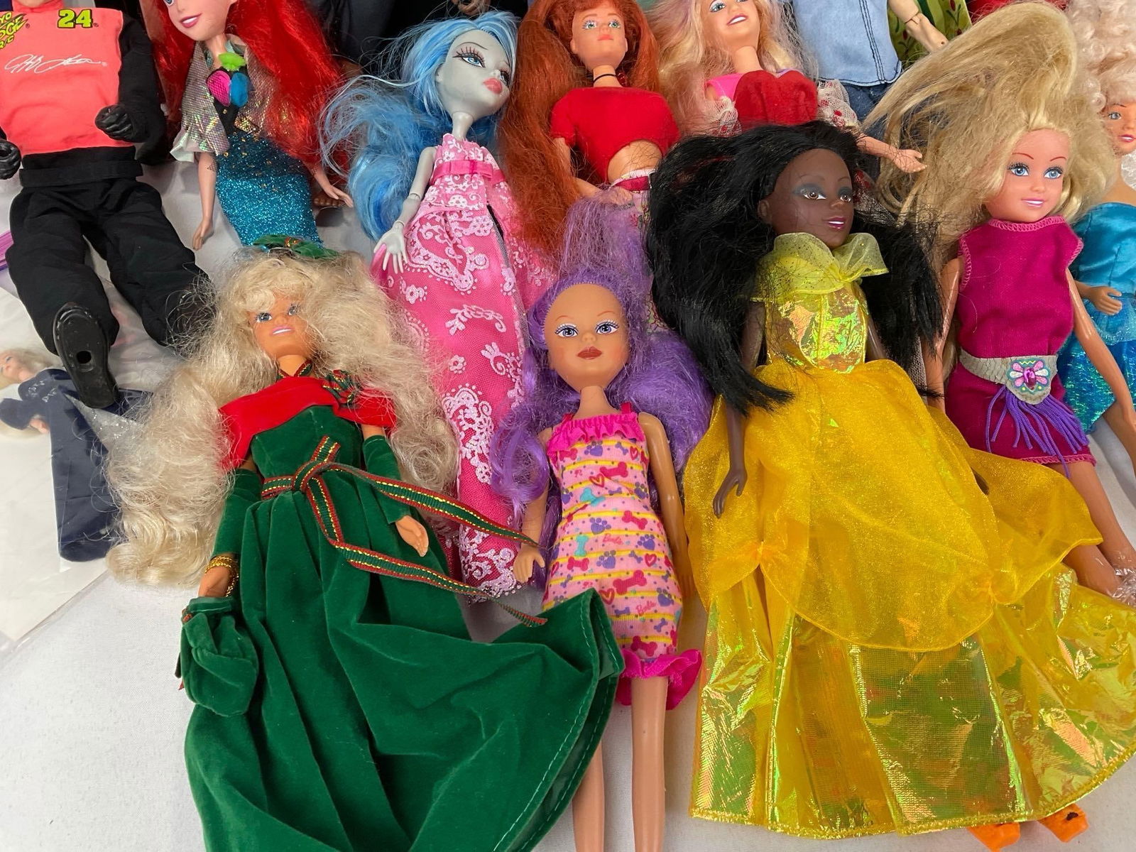 Assortment of Dolls, GI Joe types, Michael Jackson, Elsa, Ariel, Jeff Gordon & more, 1x Barbie - 2