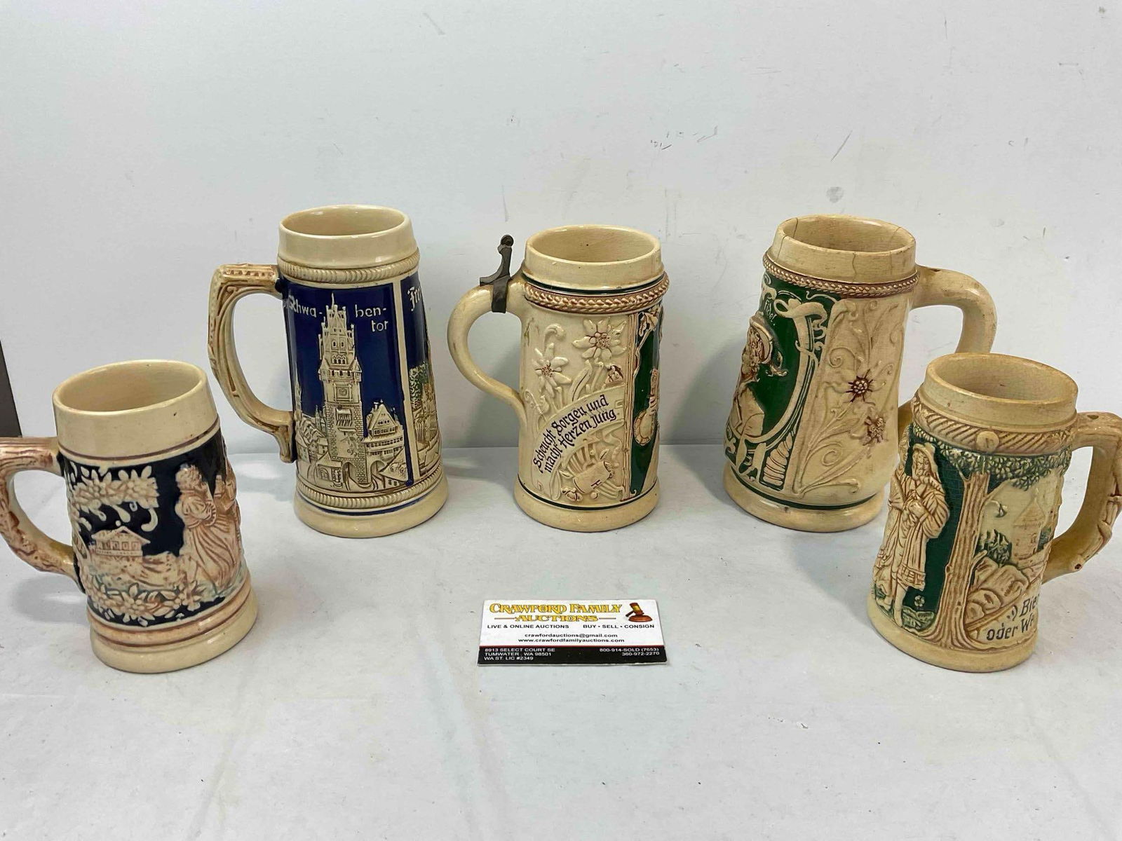5 pcs Vintage German Ceramic Souvenir Beer Steins. Good Condition. See pics.: 5 pcs Vintage German Ceramic Souvenir Beer Steins. Good Condition. Some appear to be missing lids, one has minor cracks, condition is otherwise good. Largest measures 5" x 3" x 7" DM-5360 