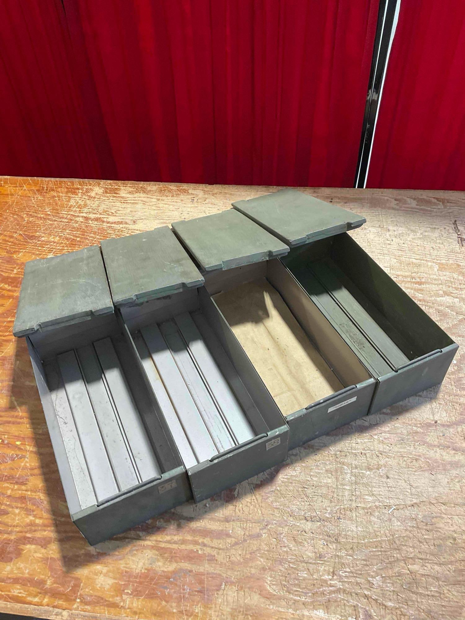 Collection of 4x Vintage Military Surplus Storage Metal Boxes with Wooden Lids: Approximately 14" x 16" x 10" altogether. Although each box is 6 1/2" x 14 1/2" x 4 1/2". Items are in fair condition. V-5360 