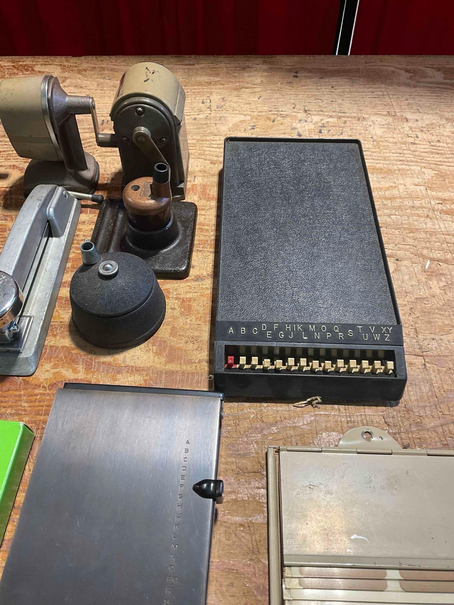 A Collection of Vintage Office Gear, Pencil Sharpeners, Staplers, and Phone Indexs - 4