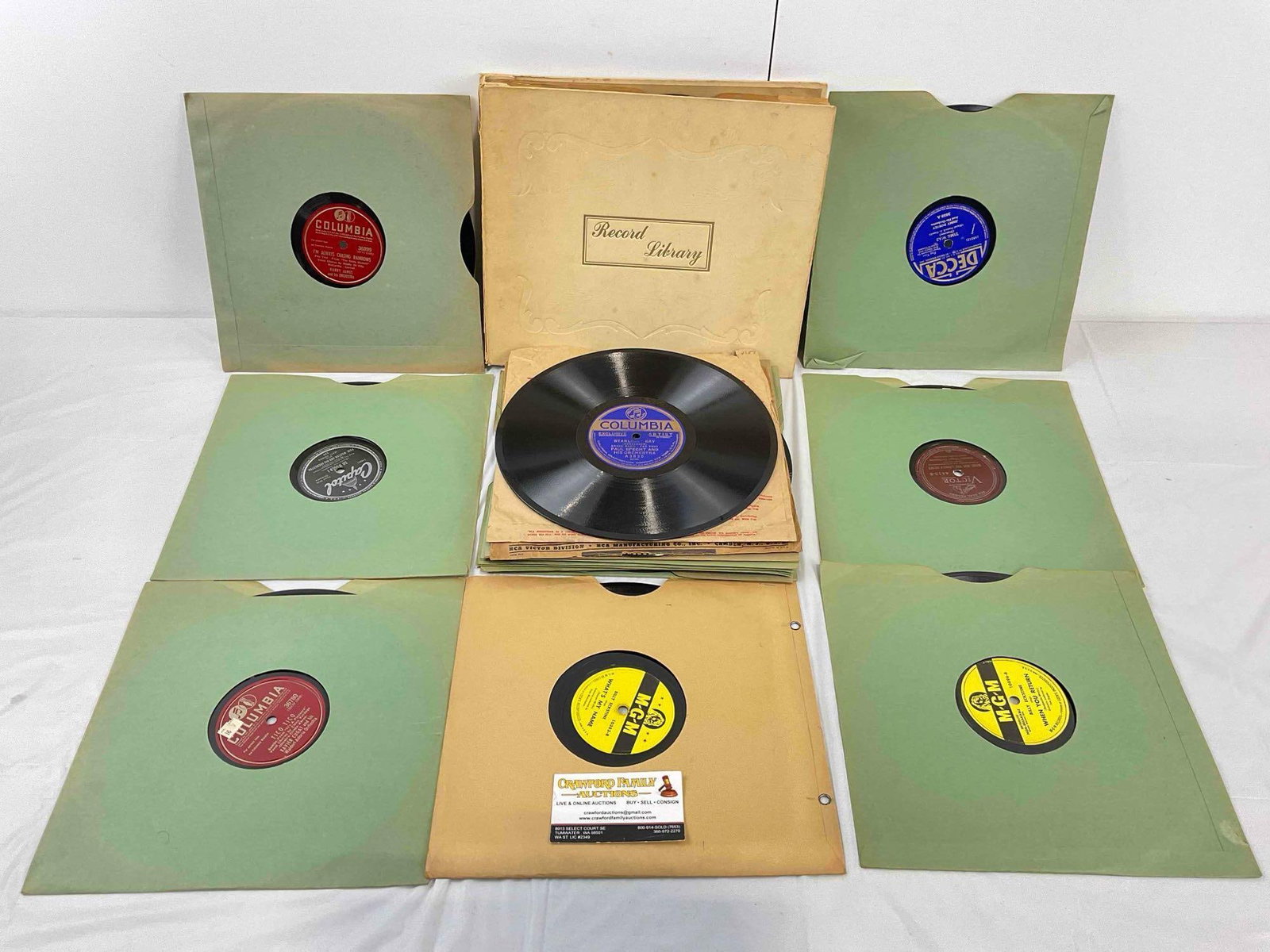 20+ pcs Vintage Vinyl Record Album Collection, incl. MGM, Columbia, Capitol, Decca & More!: 20+ pcs Vintage Vinyl Record Album Collection, incl. MGM, Columbia, Capitol, Decca & More! Minor wear indicative of age, not all sleeves have been checked, condition as is. Fits in box measuring 1