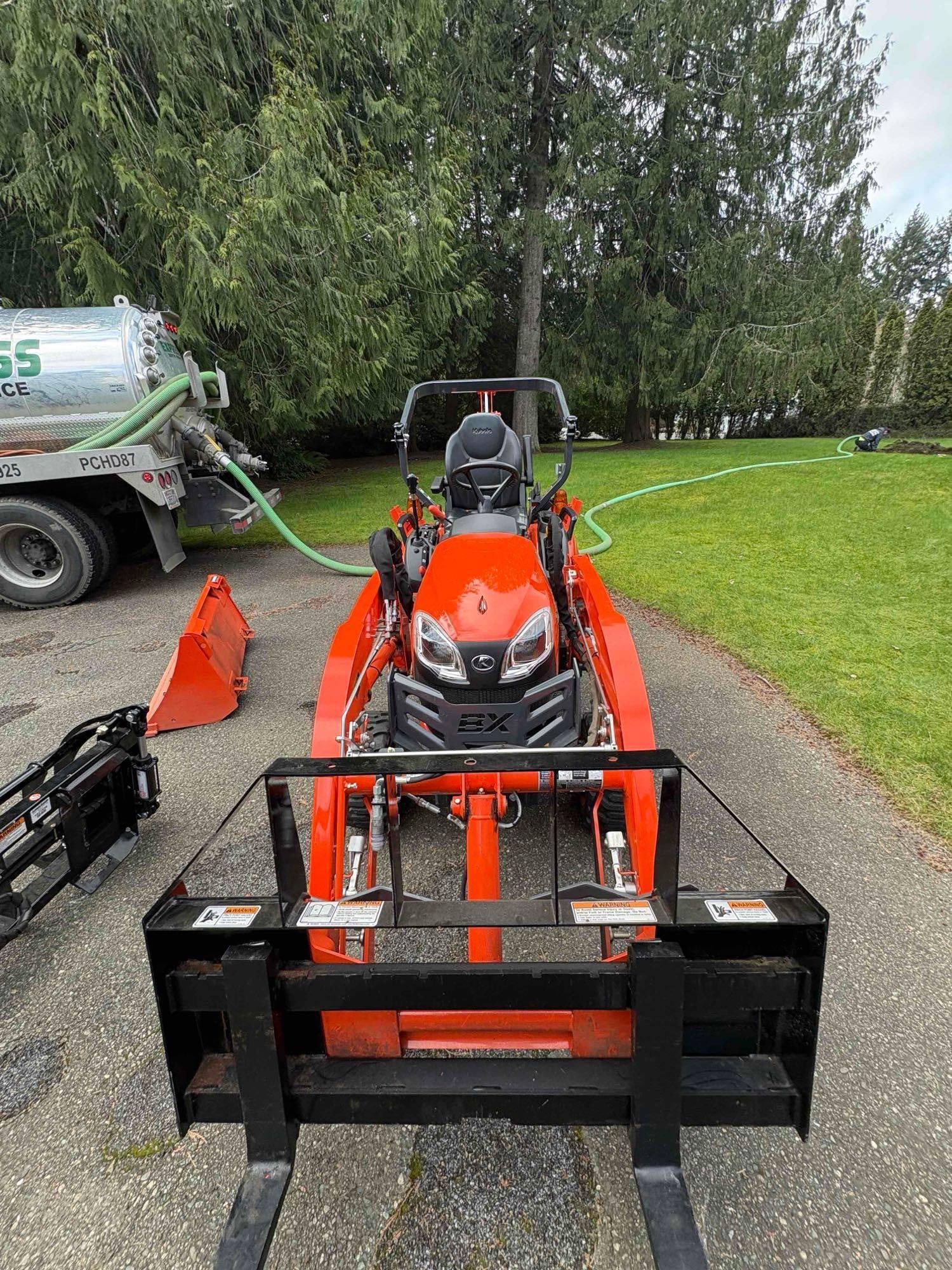 Like New 2021 Kubota BX2SLSB-R 4WD W/ Loader, Pallet forks, Backhoe, & LP Claw Grapples only 137.9 - 13