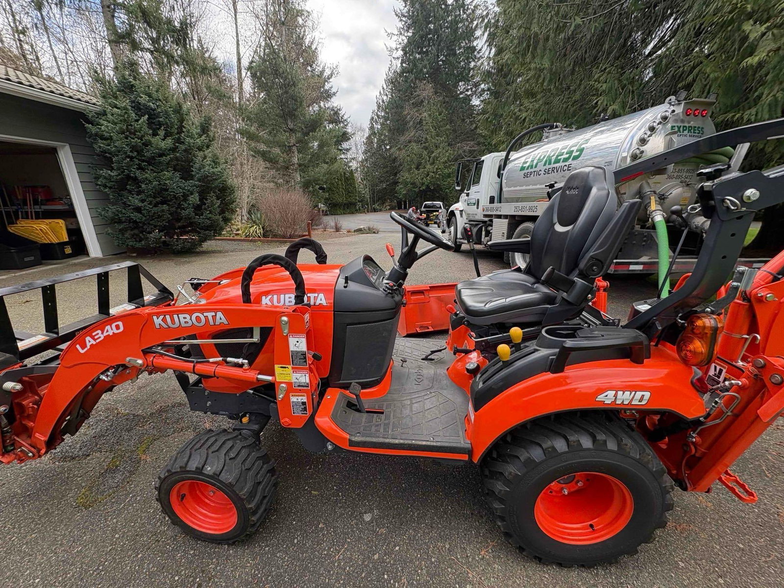 Like New 2021 Kubota BX2SLSB-R 4WD W/ Loader, Pallet forks, Backhoe, & LP Claw Grapples only 137.9 - 14