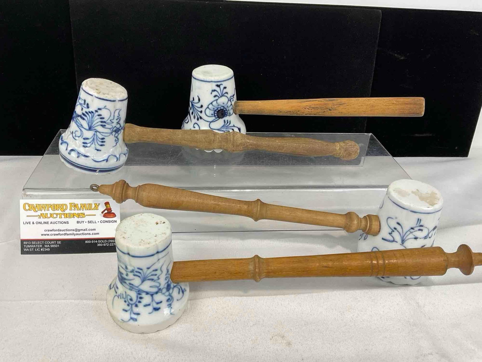 4 Blue & White Porcelain Meat Tenderizer Hammers, 13h x 6w x 4d inches, wooden handles: Handles have been removed, 3 pieces are hollow & 1 solid porcelain. Waffle style faces on the pieces. Appears to be in good shape. The piece measures approx 13h x 6w x 4d inches. See pics. E-5520 
