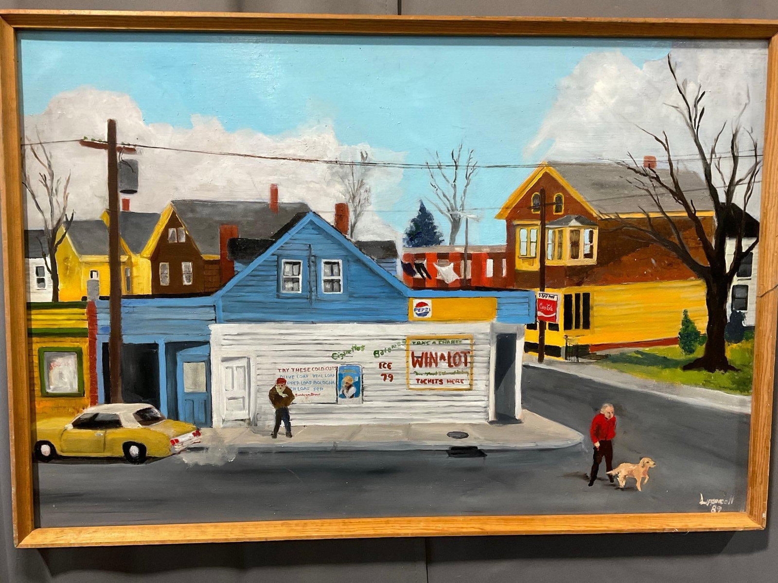 Framed Oil on Canvas Suburban Corner Market, by artist Lippencott 1989, 26h x 37w x 3d inches: Shows a corner of a town's corner market, 1980s scene. Appears to be in good shape. Seems to have had a small repair on the back of the canvas The piece measures approx 26h x 37w x 3d inches. See