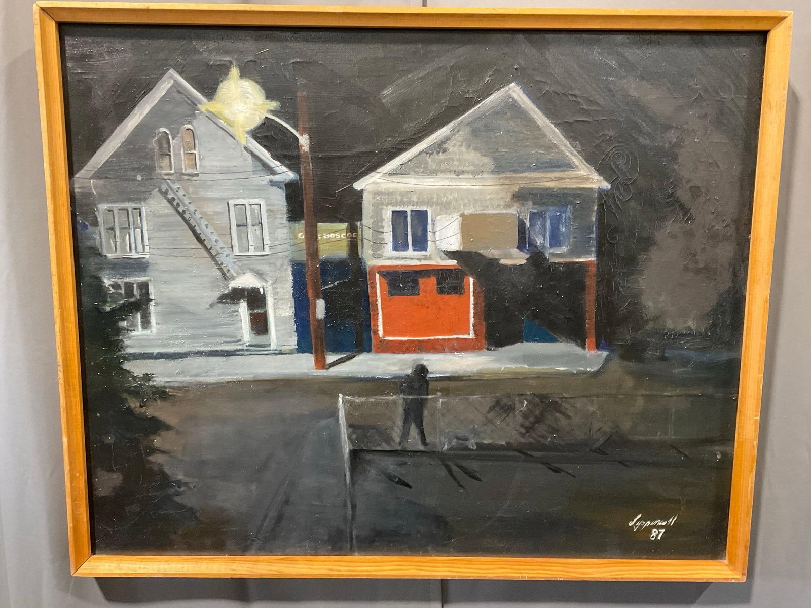 Framed Oil on Canvas Suburban Night Scene, by artist Lippencott 1987, 26h x 37w x 3d inches: Shows a lonely street light, illuminating a street late at night. Appears to be in good shape. The piece measures approx 26h x 37w x 3d inches. See pics. E-5740 