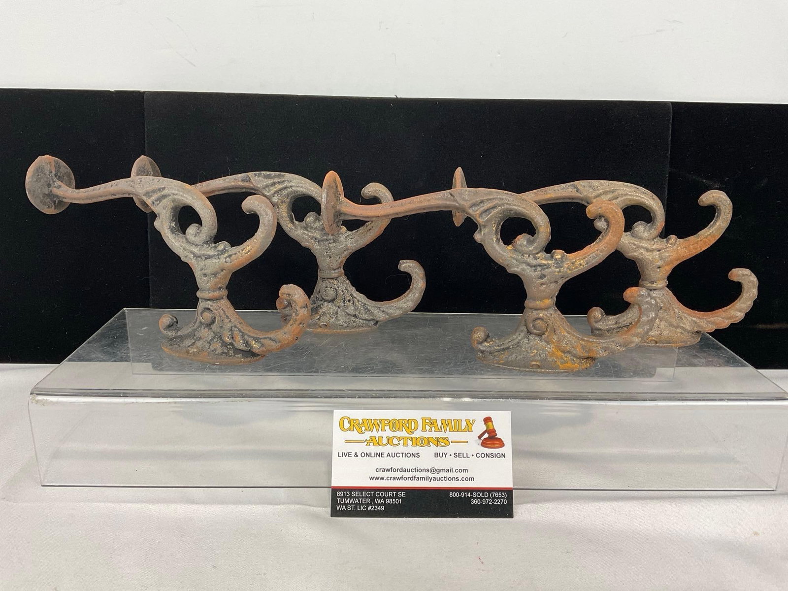 4 Cast Iron Coat Hooks, Wall Mounted some oxidation, 8h x 9w x 5d inches: Appears to be in good shape. The piece measures approx 8h x 9w x 5d inches. See pics. E-5520 