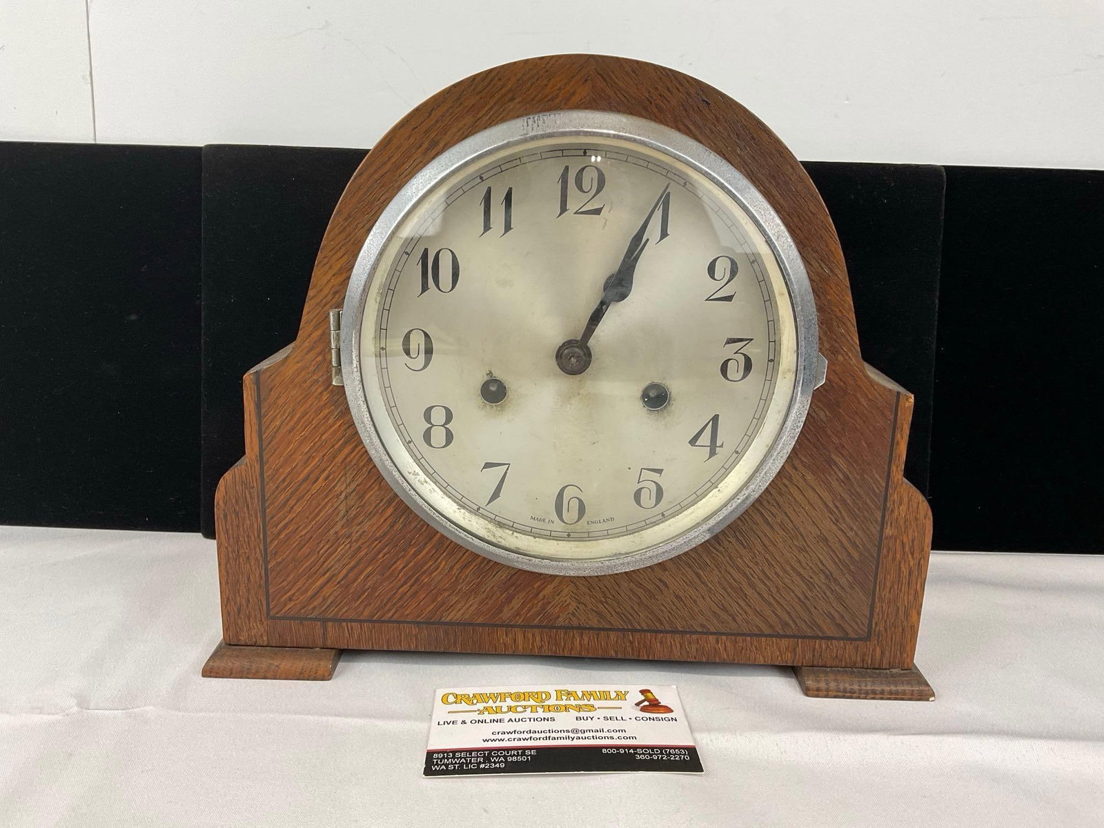 Antique Time Strike Mantel Clock w/Metal Face, 10h x 12w x 6d in: Has a badge from R.A. Jones & Sons LTD. All from the same collection. Appears to be in fair to good shape. The piece measures approx 10h x 12w x 6d inches. See pics. E-5580