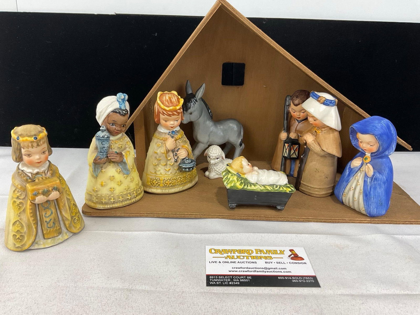 Hummel Porcelain Christmas Nativity, Joseph, Mary, Innkeeper, 3 Kings, Jesus, Lamb & Donkey w/barn: Looks to be from est.1959, no box, all designed by Janet Robson. Appears to be in good shape. The piece measures approx 8h x 18w x 12d inches. See pics. E-5650 
