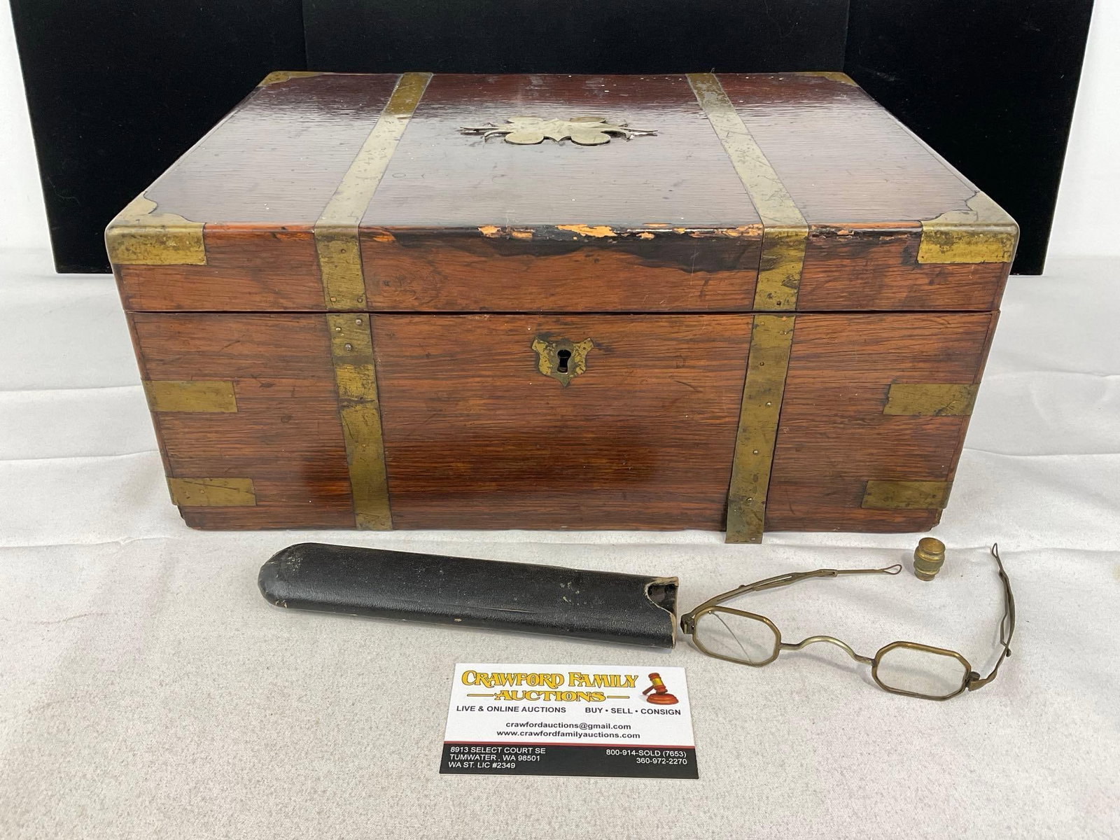 Antique mid 19th Century Wooden Tabletop Desk w/spectacles, Brass inlay, some normal wear & tear: Under one piece of the desk, it is marked This Desk given me by Aunt Rebecca Christmas 1877, (Uncle Jesses Old Desk). Appears to be in fair to good shape, especially for the age of the piece, the top