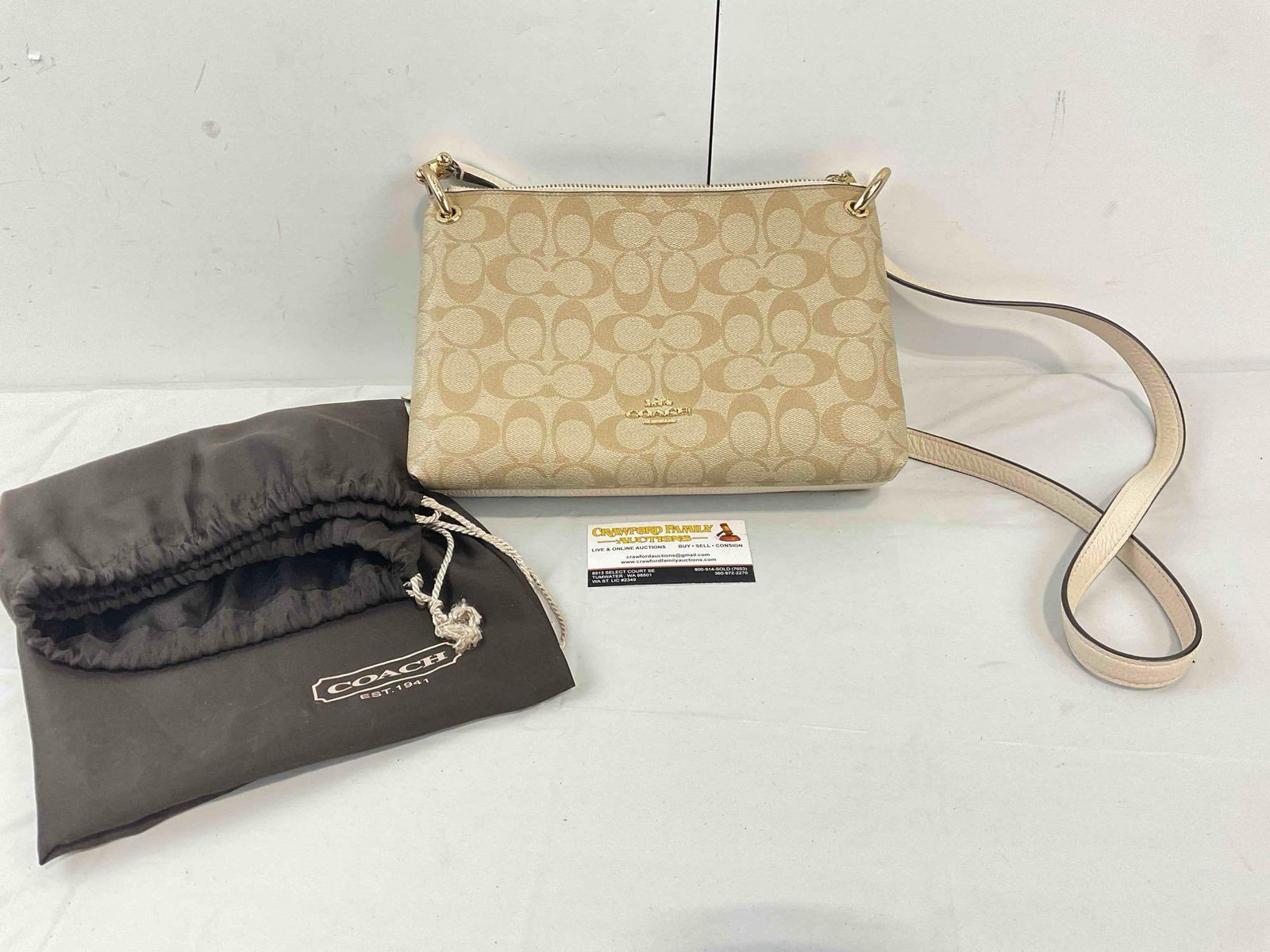 Coach Mia Crossbody Leather & Canvas Purse in Ivory/Tan Color. Very Good Condition. See pics.: Coach Mia Crossbody Leather & Canvas Purse in Ivory/Tan Color. Includes carrying bag. Very Good Condition. Has a few scuffs and wear indicative of age and use, condition is otherwise very good. Me