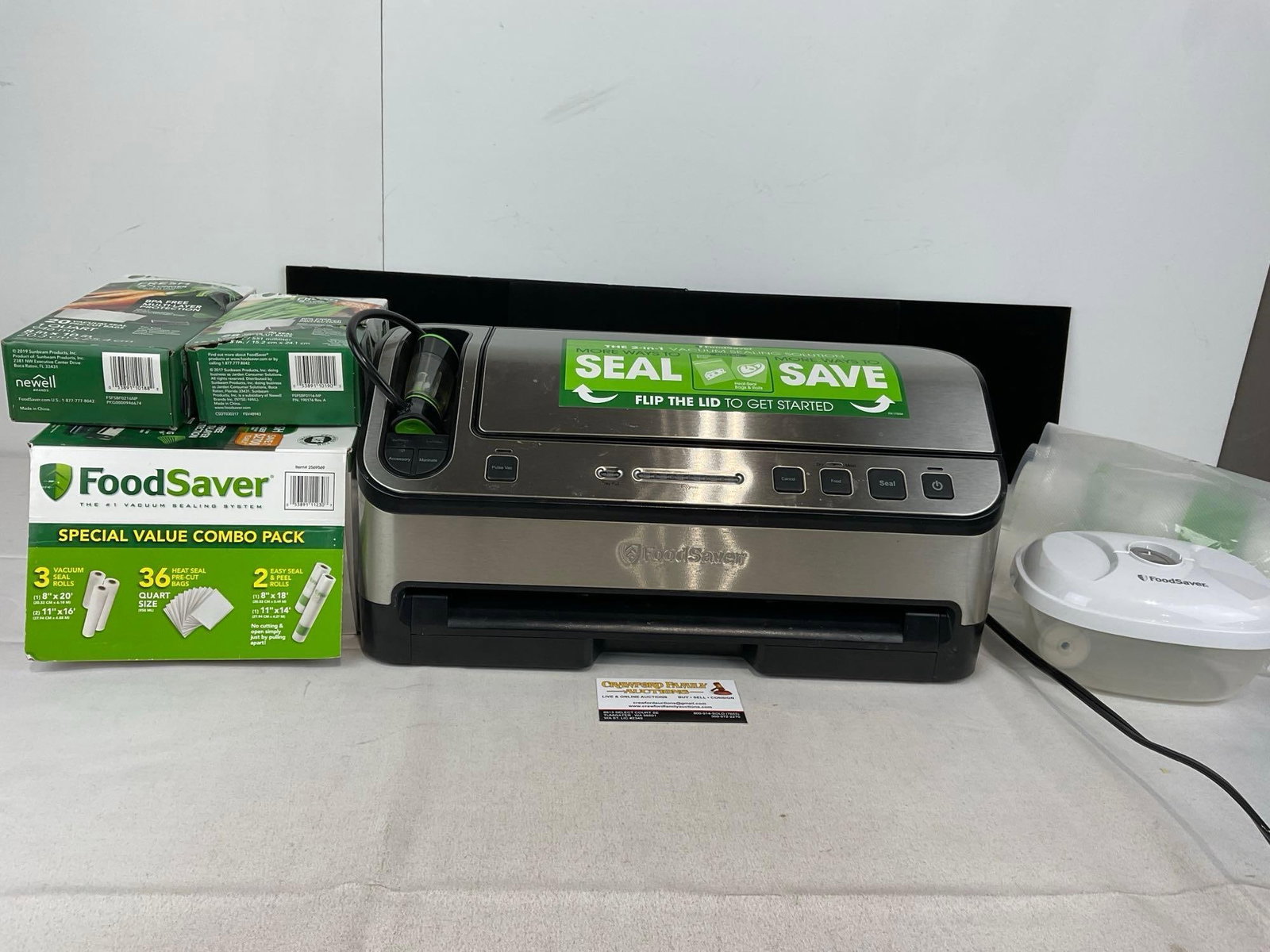 FoodSaver Model V4880 Bag Sealer, w/Rolls of bags, 9h x 20w x 20d inches, tested & powers on: Appears to be in good shape. The piece measures approx 9h x 20w x 20d inches. See pics. E-5690 