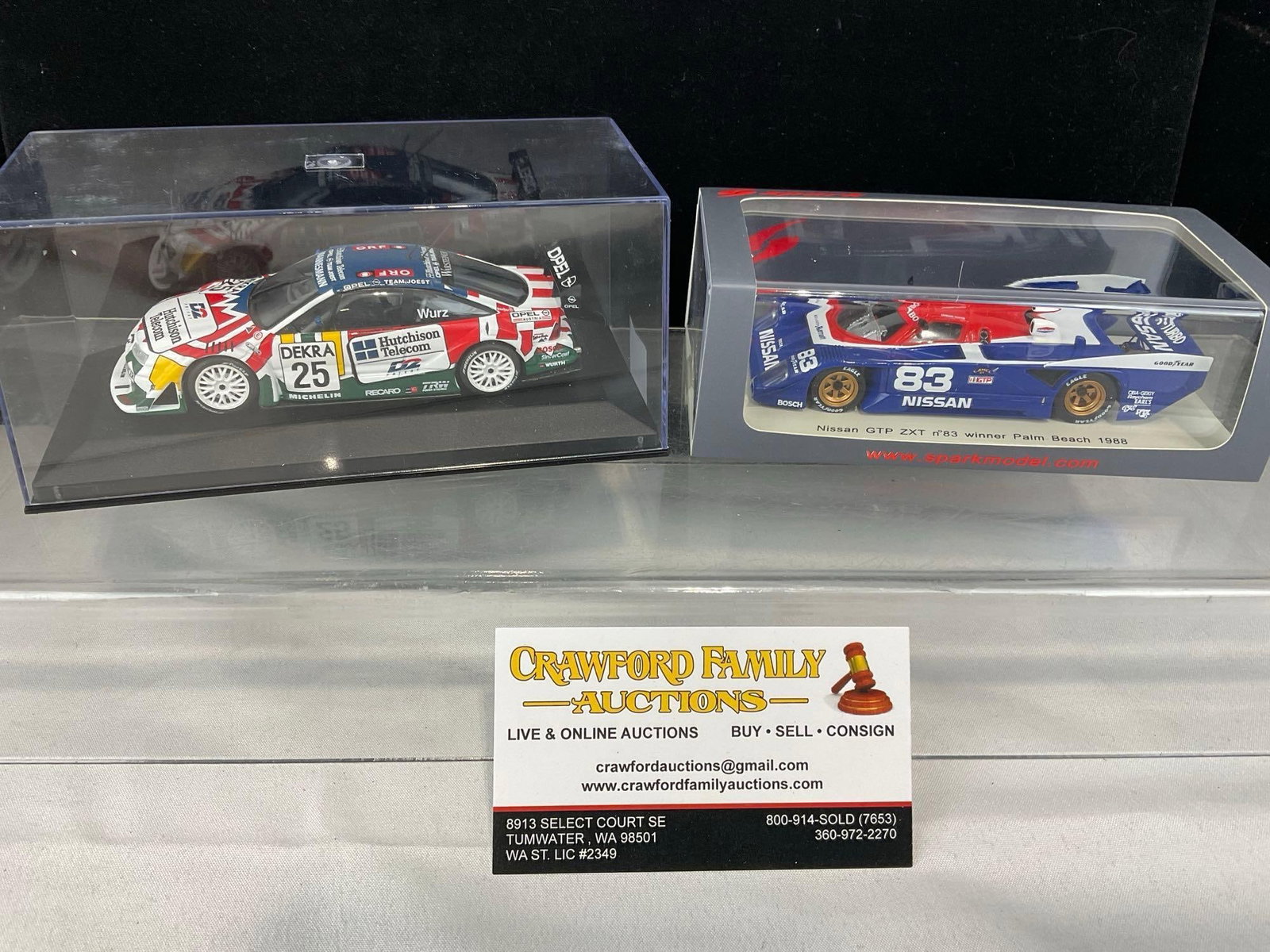 2 1/43 Scale Diecast Cars, 1988 Nissan GTP 2xT & 1996 Opel Calibra: Appears to be in good shape. The piece measures approx 6h x 7w x 4d inches. See pics. E-5420 