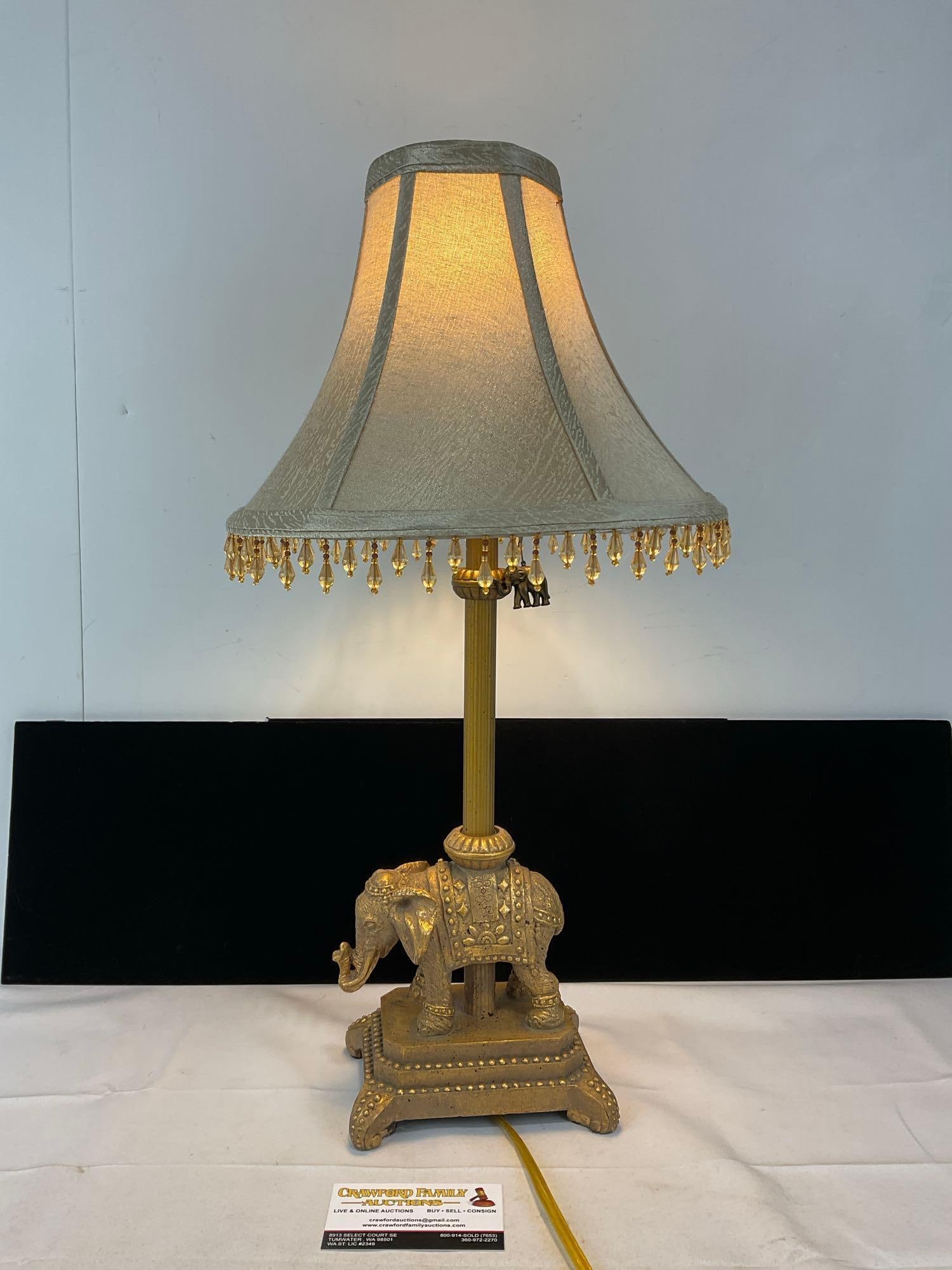 Tan Lamp, tested & working, Resin Elephant Figural base, 22h x 11w x 11d inches: Appears to be in good shape. The piece measures approx 22h x 11w x 11d inches. See pics. E-5660 *Oversized shipping may apply* 