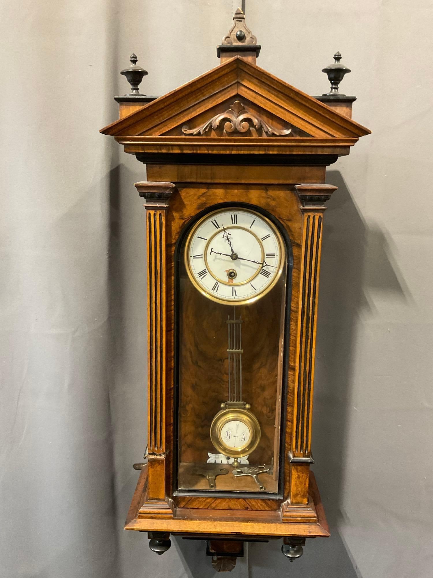 Antique Vienna Regulator, Walnut & Dark Tone Wood, Pendulum Time, w/2 Keys 35h x 14w x 7d inches: All from the same collection. Appears to be in fair to good shape. The piece measures approx 35h x 14w x 7d inches. See pics. E-5520 *Oversized shipping may apply* 