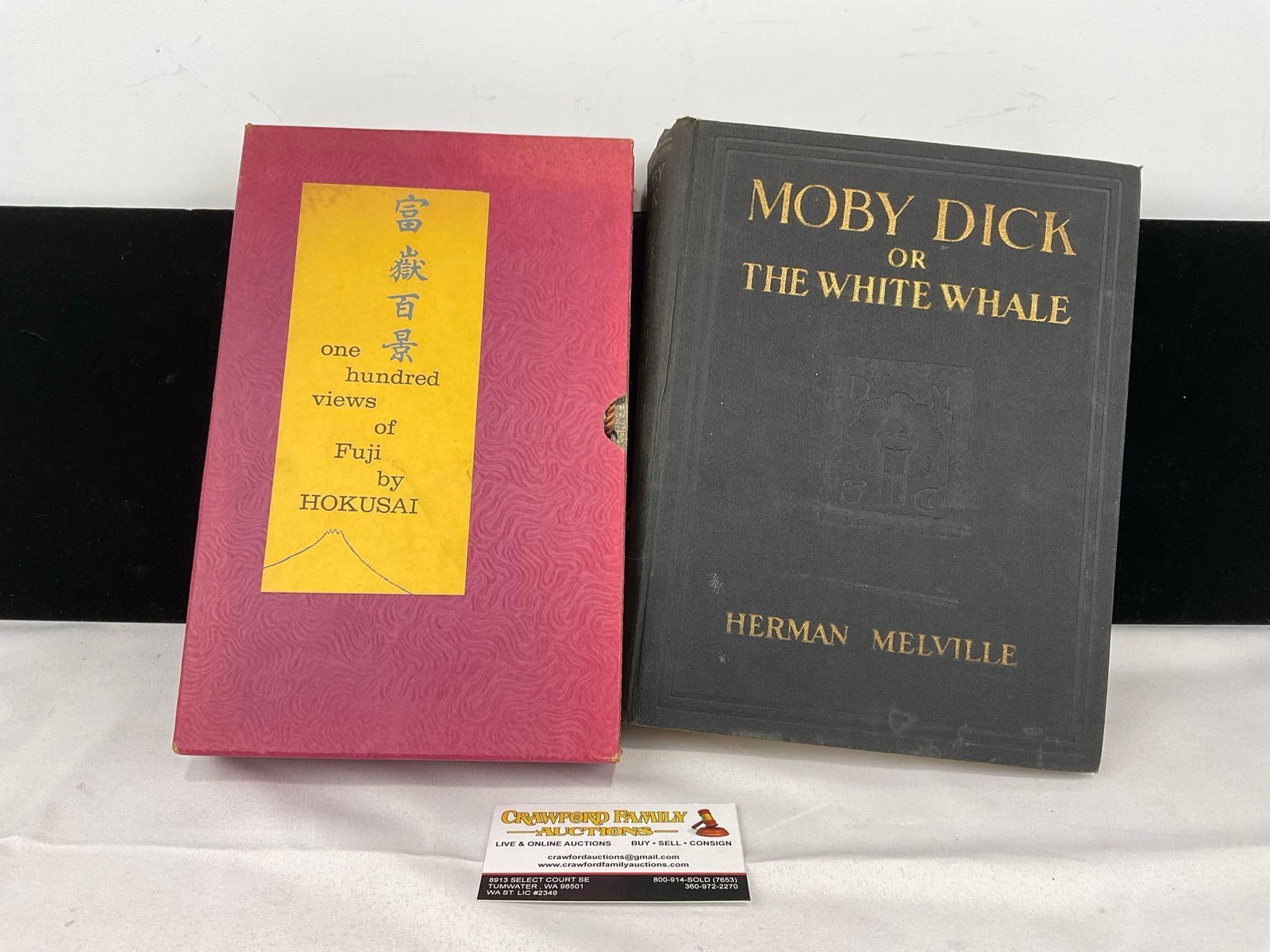 Pair of Books, 1923 Moby Dick or The White Whale by Melville & One Hundred Views of Fuji by Hokusai: Appears to be in good shape. The piece measures approx 4h x 9w x 11d inches. See pics. E-5360