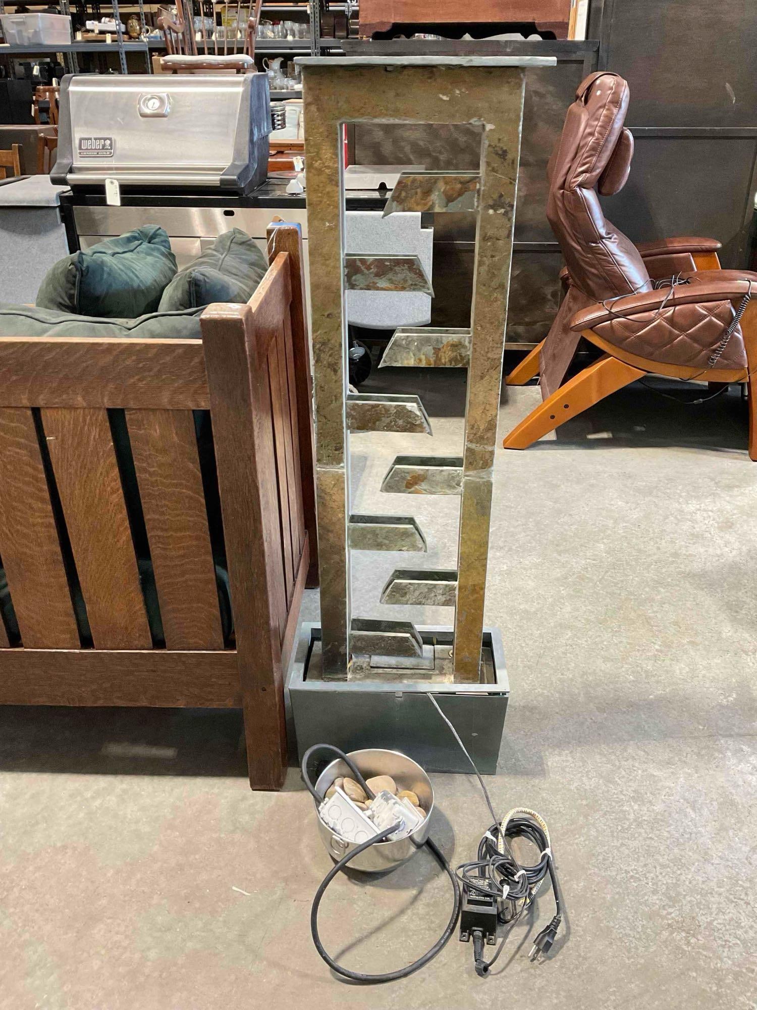 Tall Staggered Stone & Composite Standing Water Fountain. Tested, Pump Works. See pics.: Tall Staggered Stone & Composite Standing Water Fountain. Tested, Pump Works, will need water to operate properly. Includes extension cords and switches. Minor wear indicative of age and use,