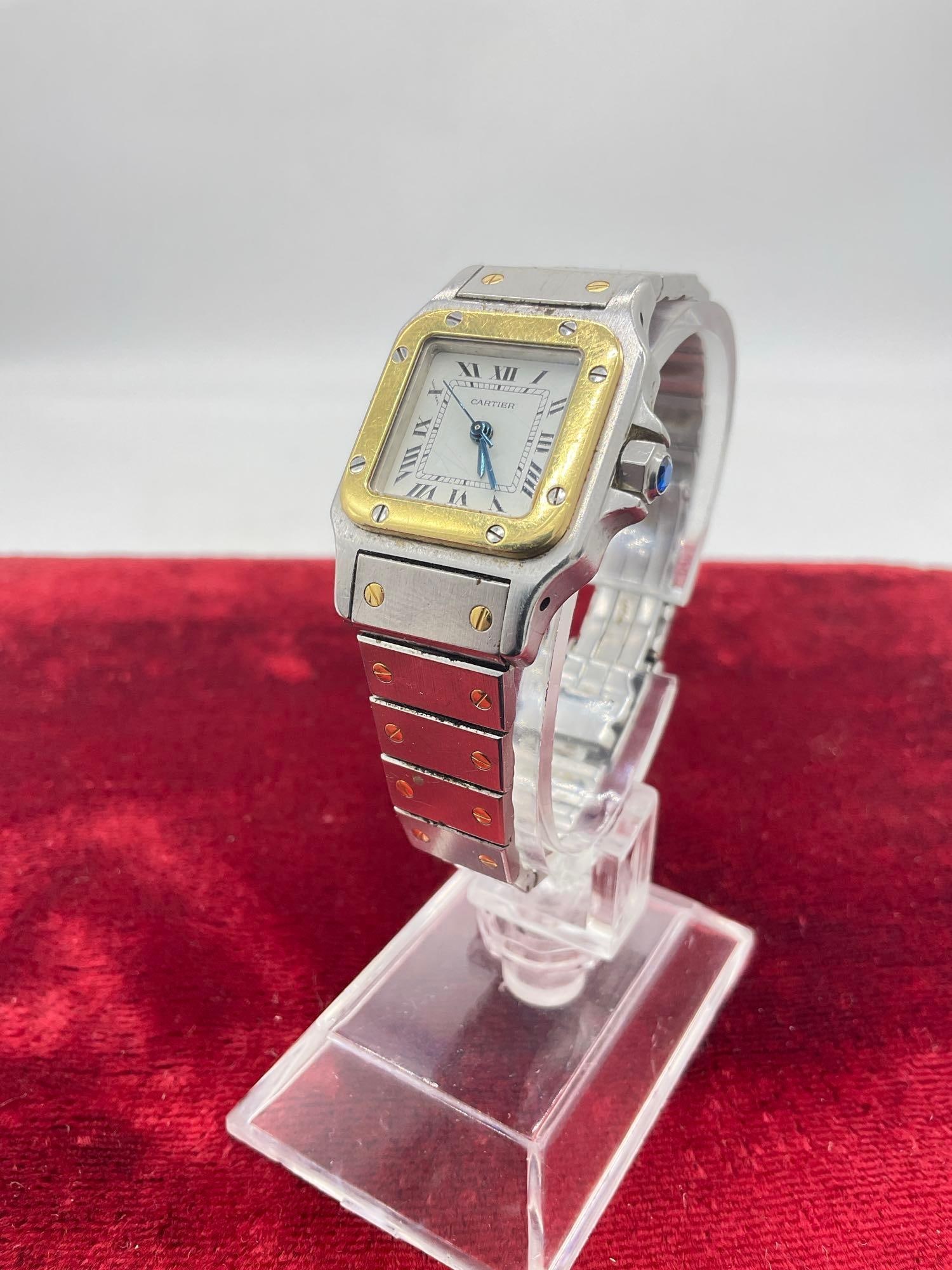 Vintage Cartier Santos Galbee 0902 18k Yellow Gold/ Steel 24MM Ladies Automatic Watch running: C-5520 Serial Number 090205564 Information is AI generated Please see pics Sold as-is Key Technical Specifications Reference Number: 0902 Case Size: 24mm x 35mm (approx.