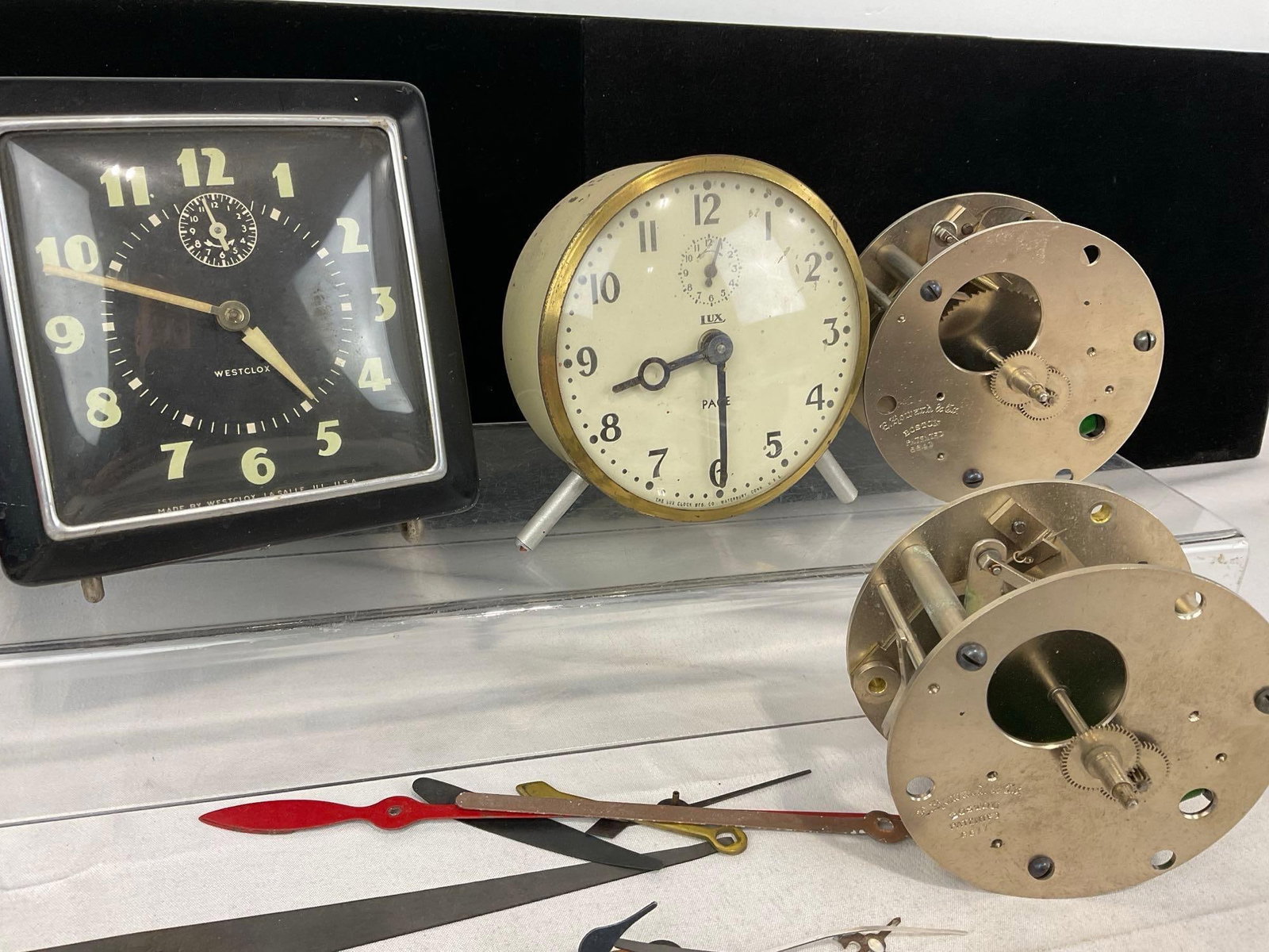 2 Casio F-108WH Watches, Westclox & Lux Desk Clocks, 2 E. Howard & Co movements, & clock hand parts - 2