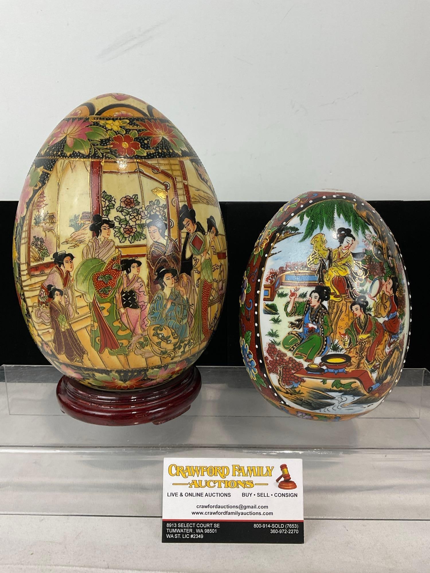 Pair of Porcelain Handpainted Egg Figures, one on wooden stand, Satsuma Style design: Appears to be in good shape. The piece measures approx 10h x 11w x 7d inches. See pics. E-5500