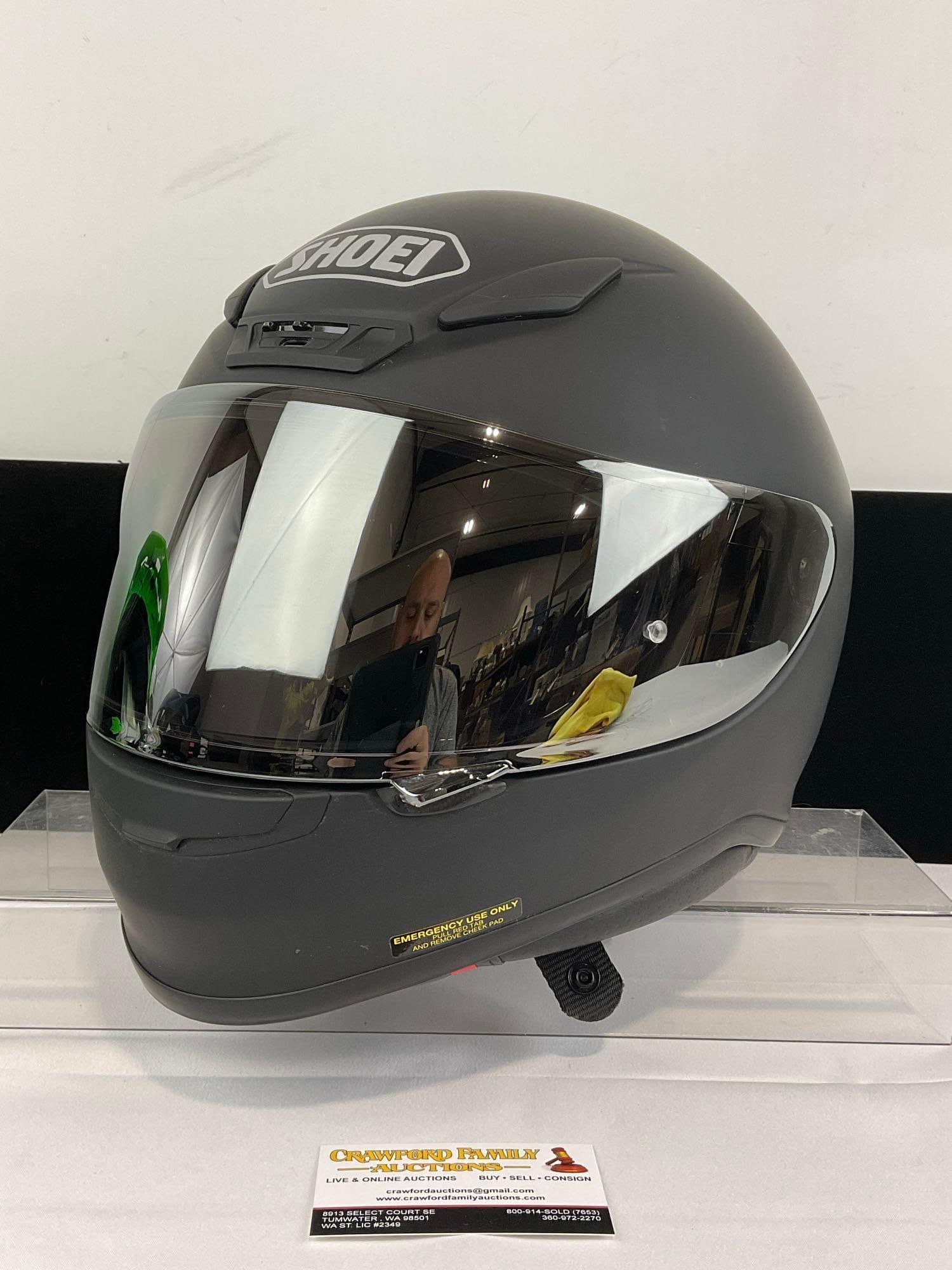Shoei RF-1200 Motorcycle Helmet, Full Face, matte black finish, 11h x 14w x 12d: Appears to be in good shape, like new, some slight shelf wear, kept in storage, likely never worn. Should be same size as the others, about size XL. The piece measures approx 11h x 14w x 12d inches.