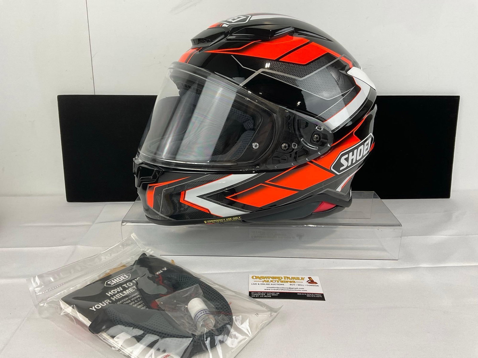 Shoei NXR RF-1400 Motorcycle Helmet, size XL, Black & Orange, 12h x 14w x 12d inches: Previously purchased for 449.00 dollars. Appears to be in good shape. Like new, kept in storage, likely never worn. The piece measures approx 12h x 14w x 12d inches. See pics. E-5910