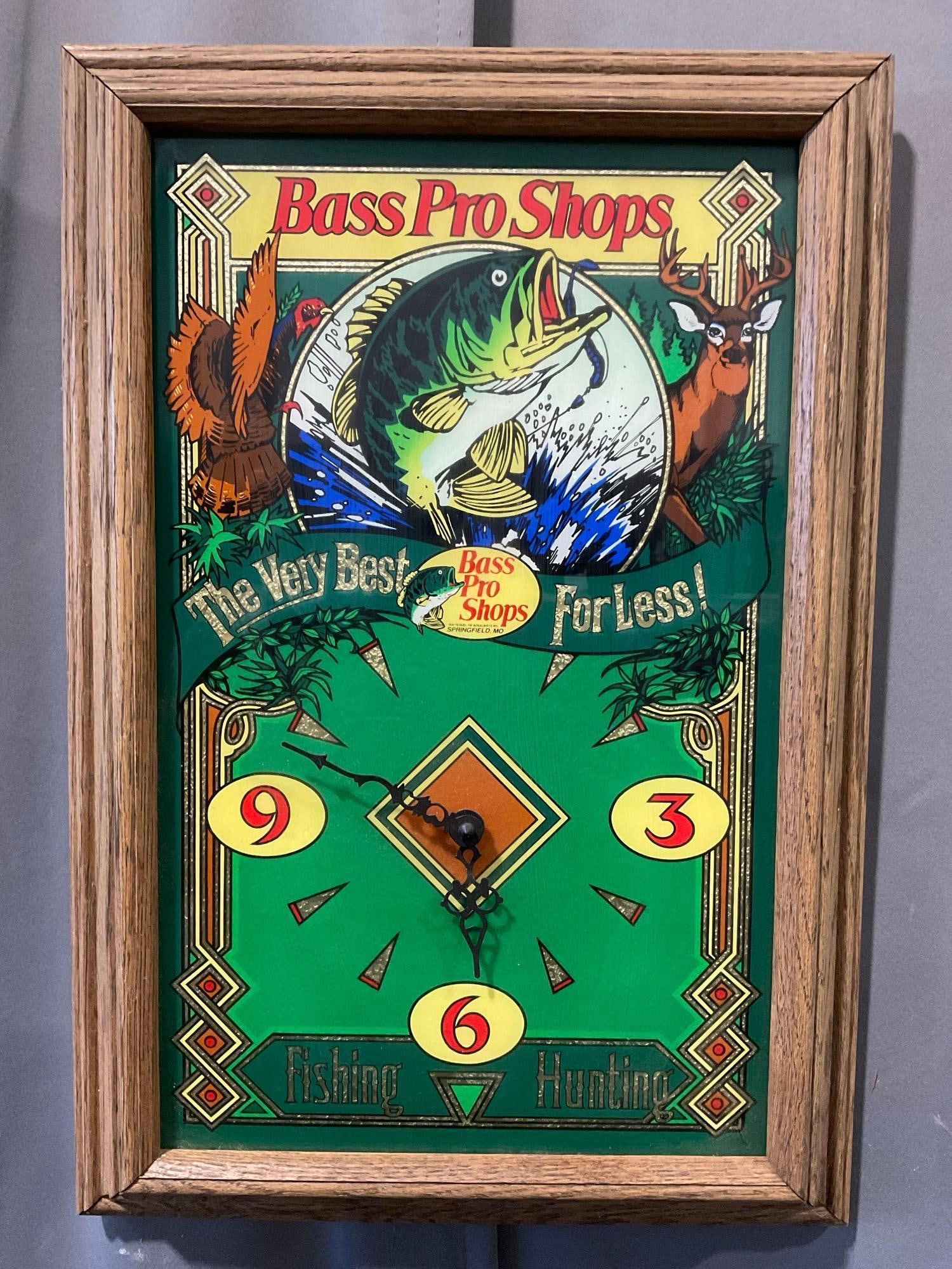 Vintage Bass Pro Shops Framed Clock, 20h x 14w x 3d inches: Appears to be in good shape. The piece measures approx 20h x 14w x 3d inches. See pics. E-5600