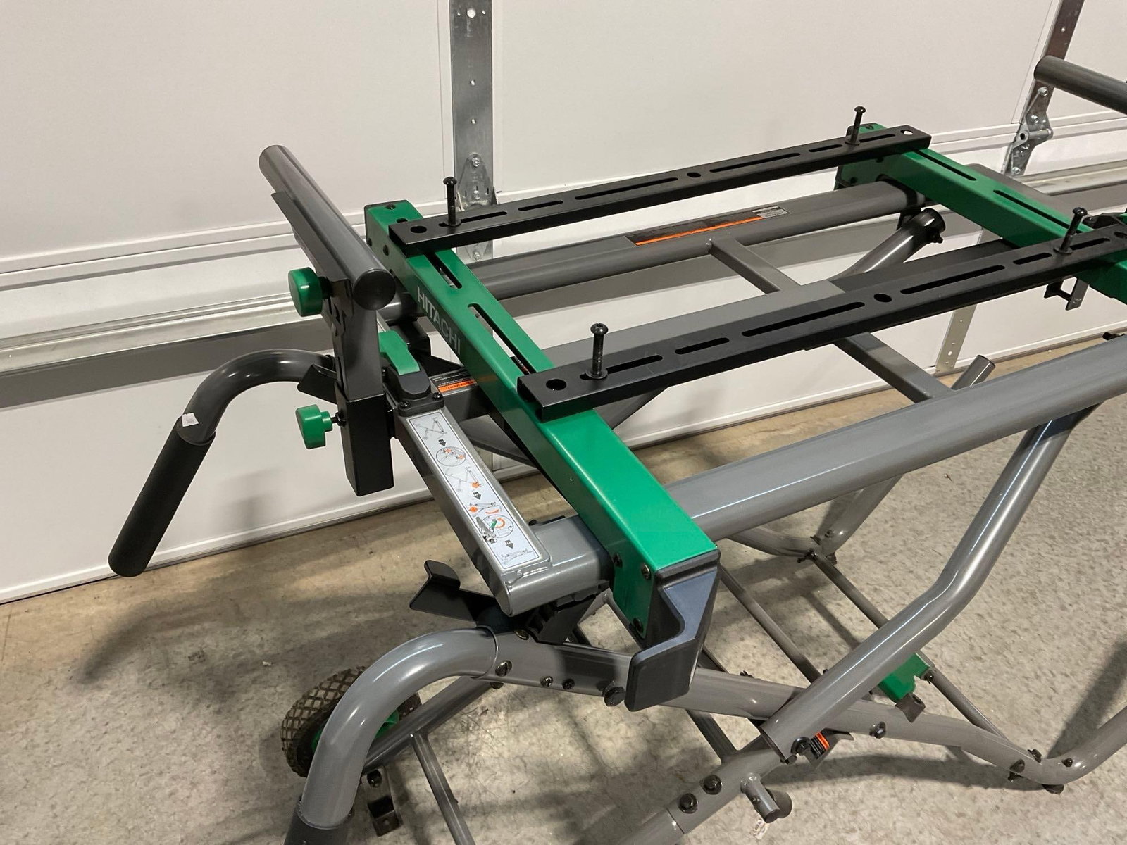 Hitachi UU 240R Universal Miter Saw Stand, roughly 54h x 32w x 20d inches - 2
