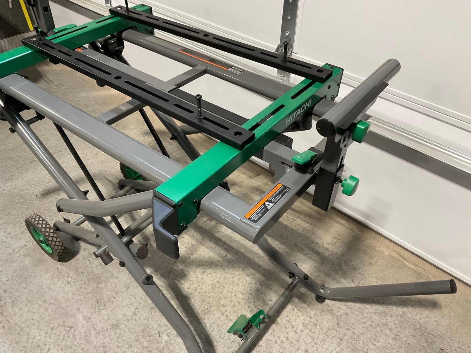 Hitachi UU 240R Universal Miter Saw Stand, roughly 54h x 32w x 20d inches - 3