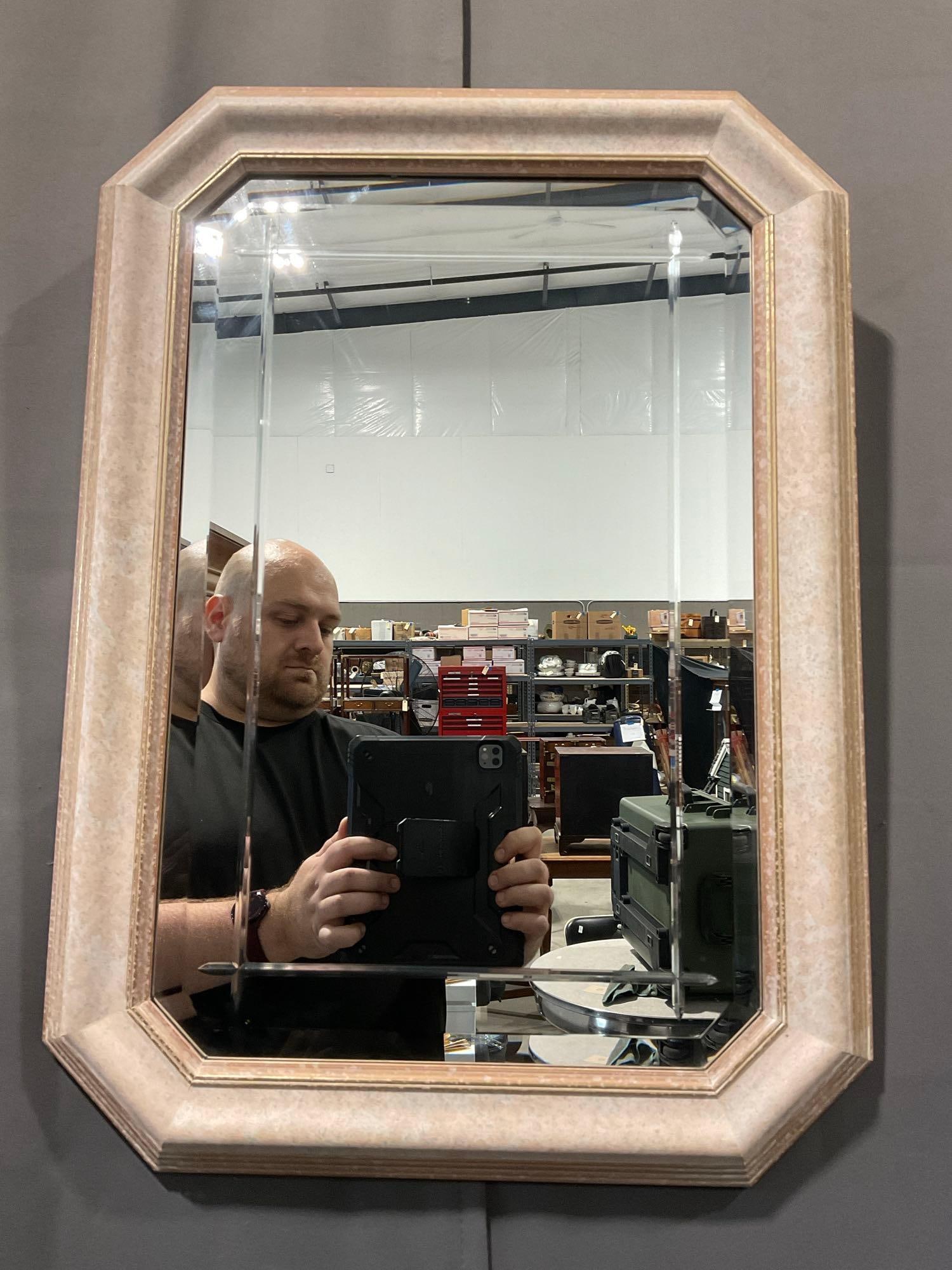 Vintage Consort Pictures Octagonal Beveled Wall Mirror in Light Pink Frame, 27h x 19w inches: Consort Pictures Productions of North Ireland. Appears to be in good shape. The piece measures approx 27h x 19w x 3d inches. See pics. E-5770*Special Shipping Required - Contact Auction House*
